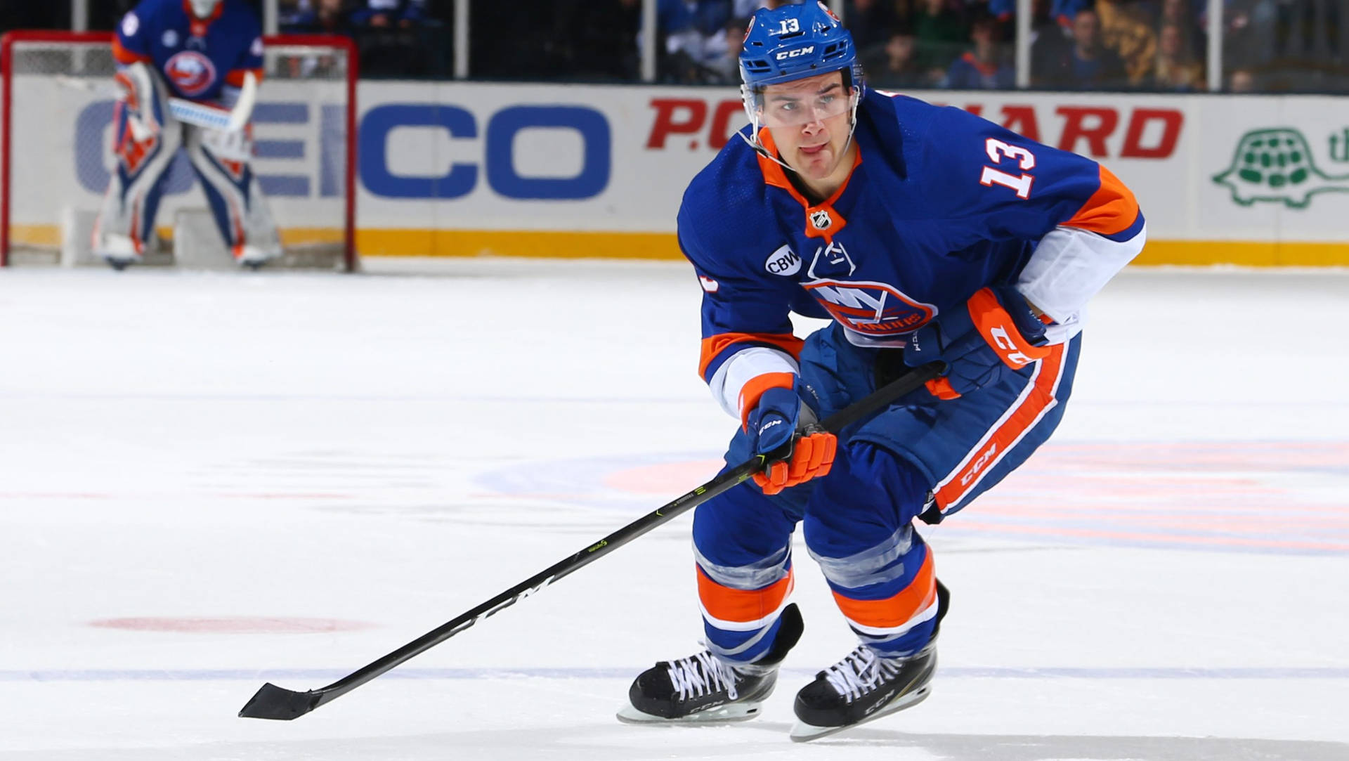 Skating Canadian Ice Hockey Player Mathew Barzal Wide Angle Shot Background