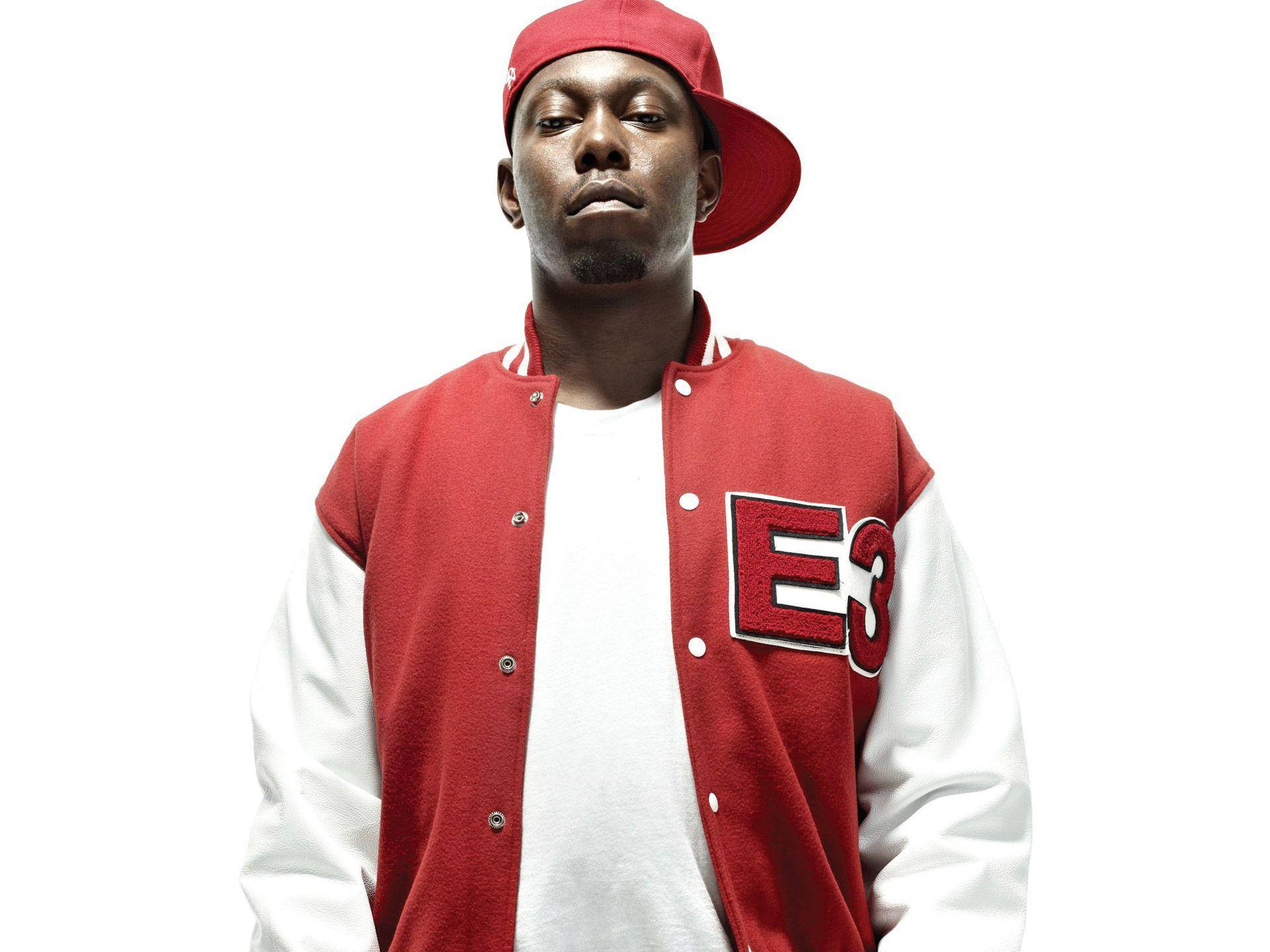 Skepta In Red Jersey Background