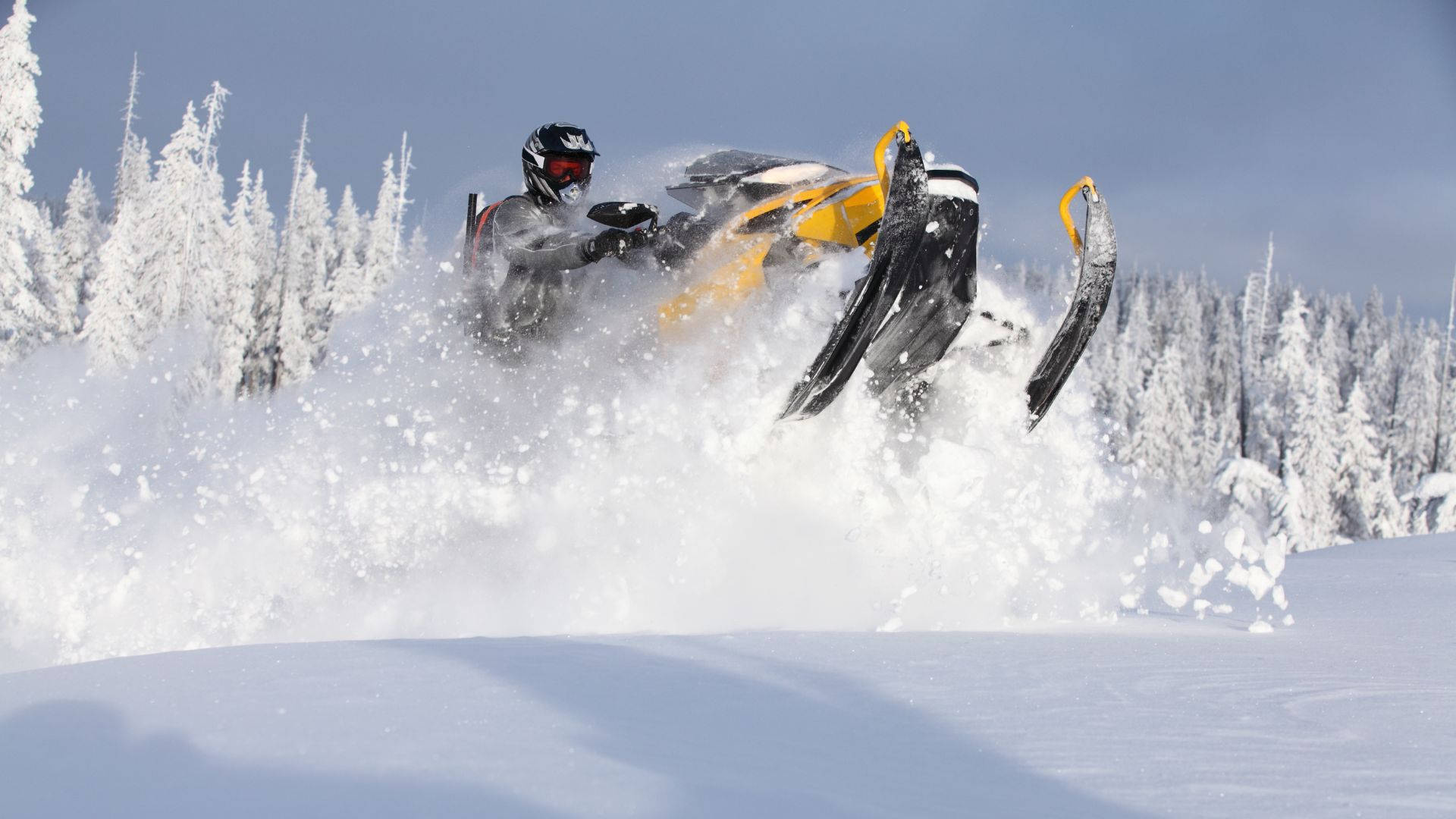 Ski Jumping Using Ski-doo Snowmobiles Background