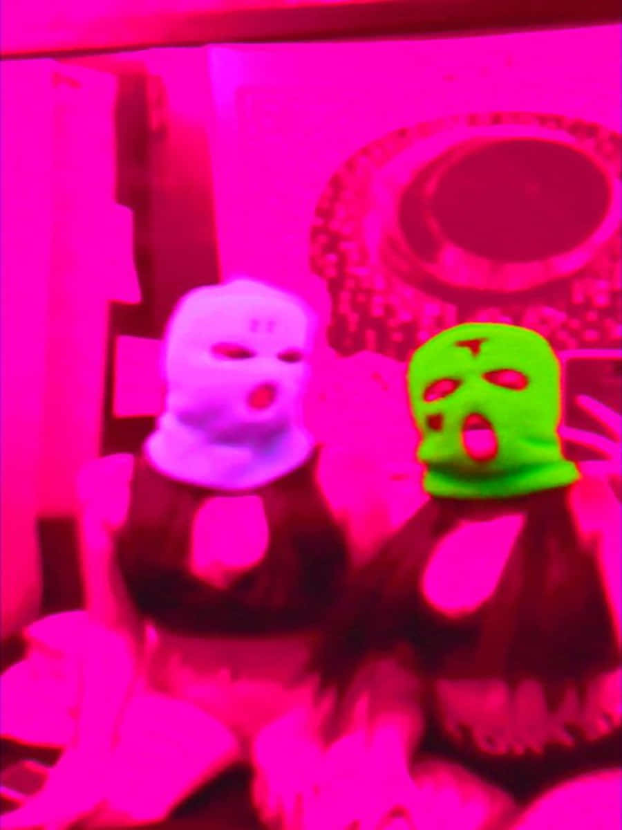 Ski Mask Girl In A Room With Pink Light Background