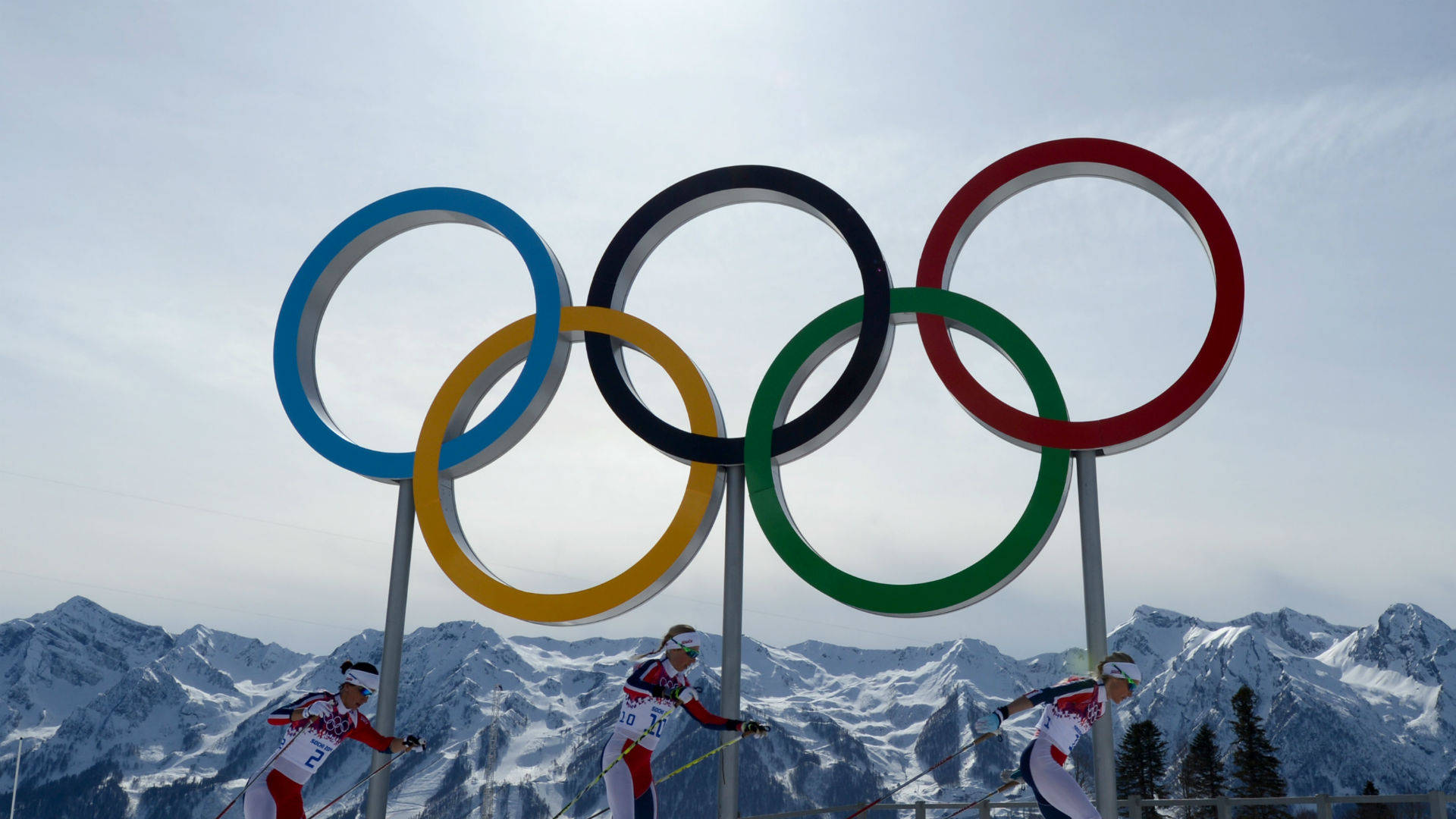 Ski Players At Winter Olympics Logo Background
