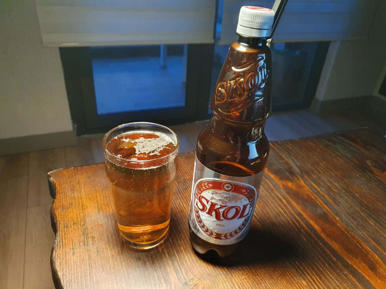 Skol Beer Bottleand Glass Background