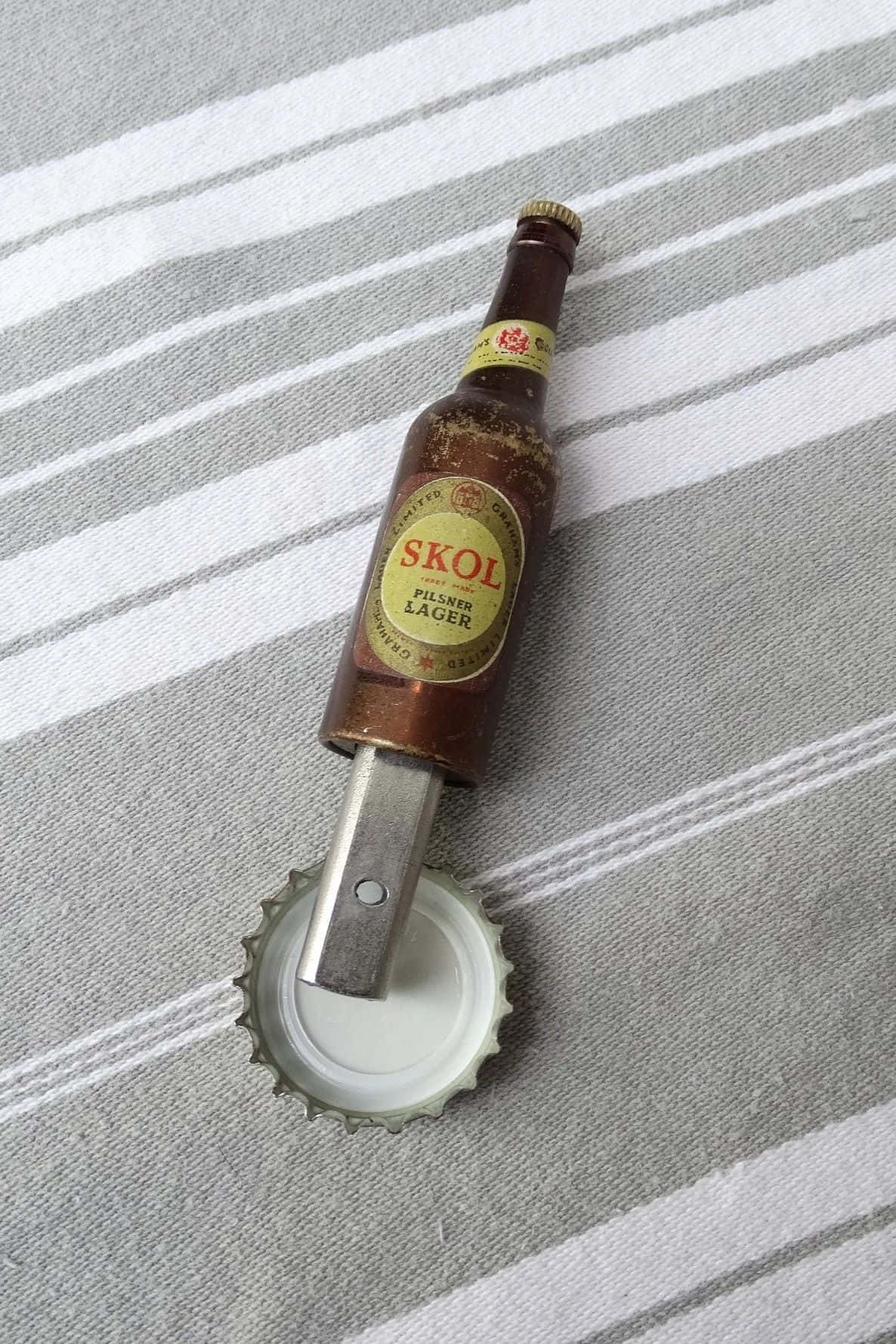 Skol Beer Bottlewith Capand Opener Background