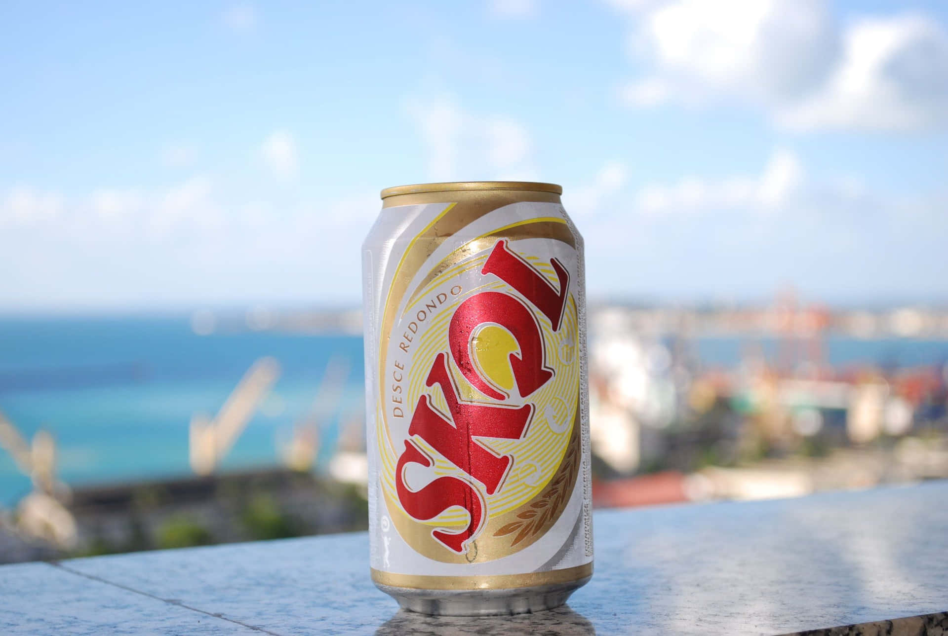 Skol Beer Can Overlooking Cityscape Background