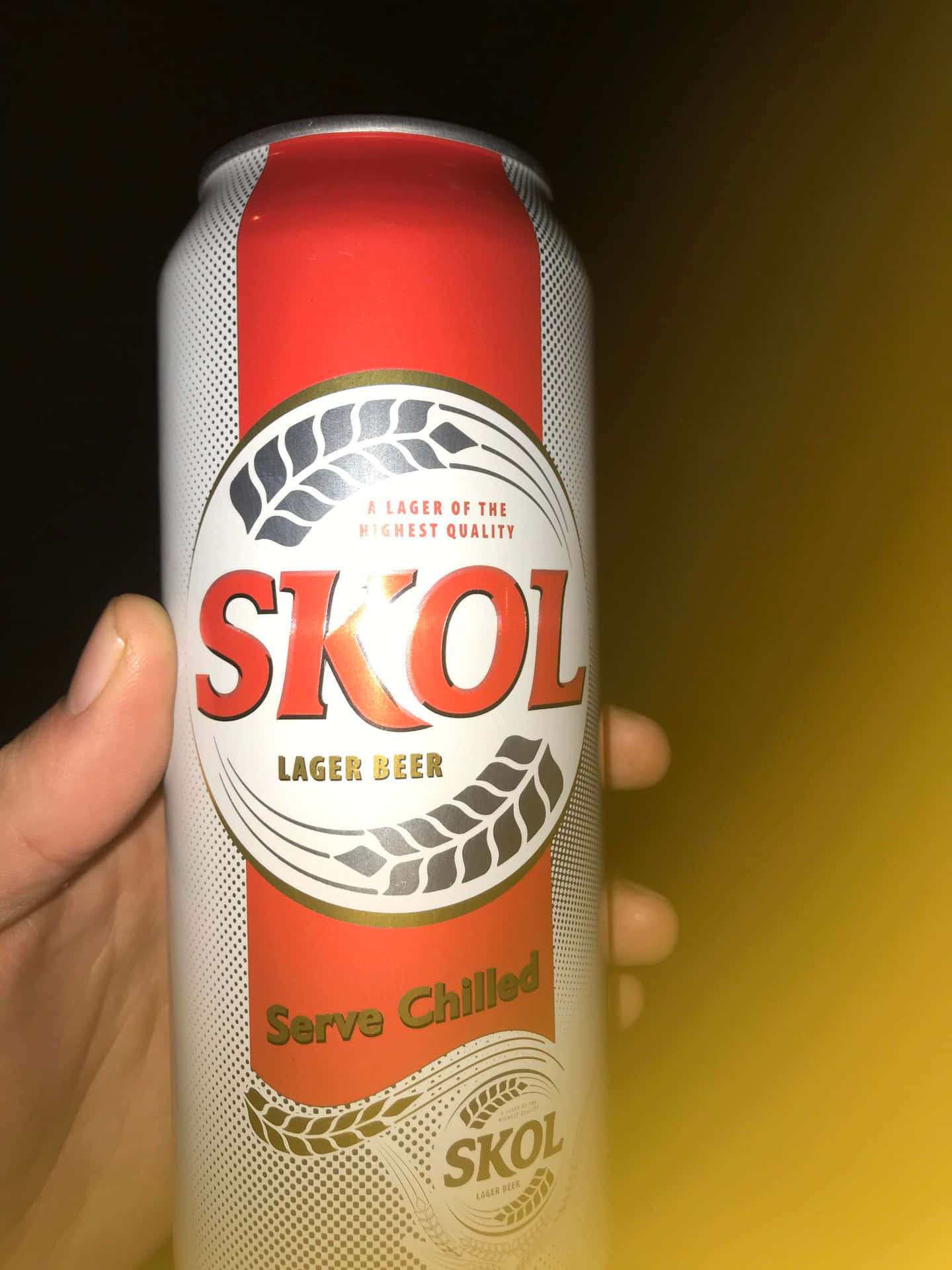 Skol Lager Beer Can Held Background