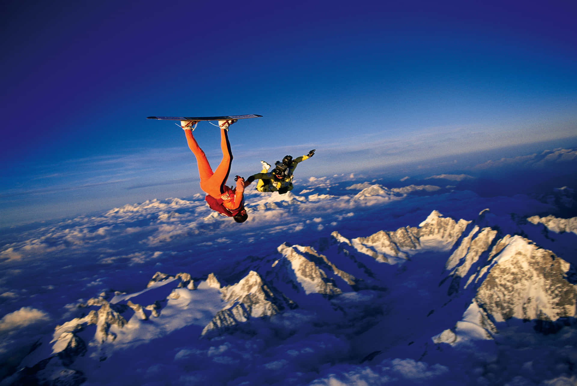 Skydiving Mountain Ranges Surfboard Background