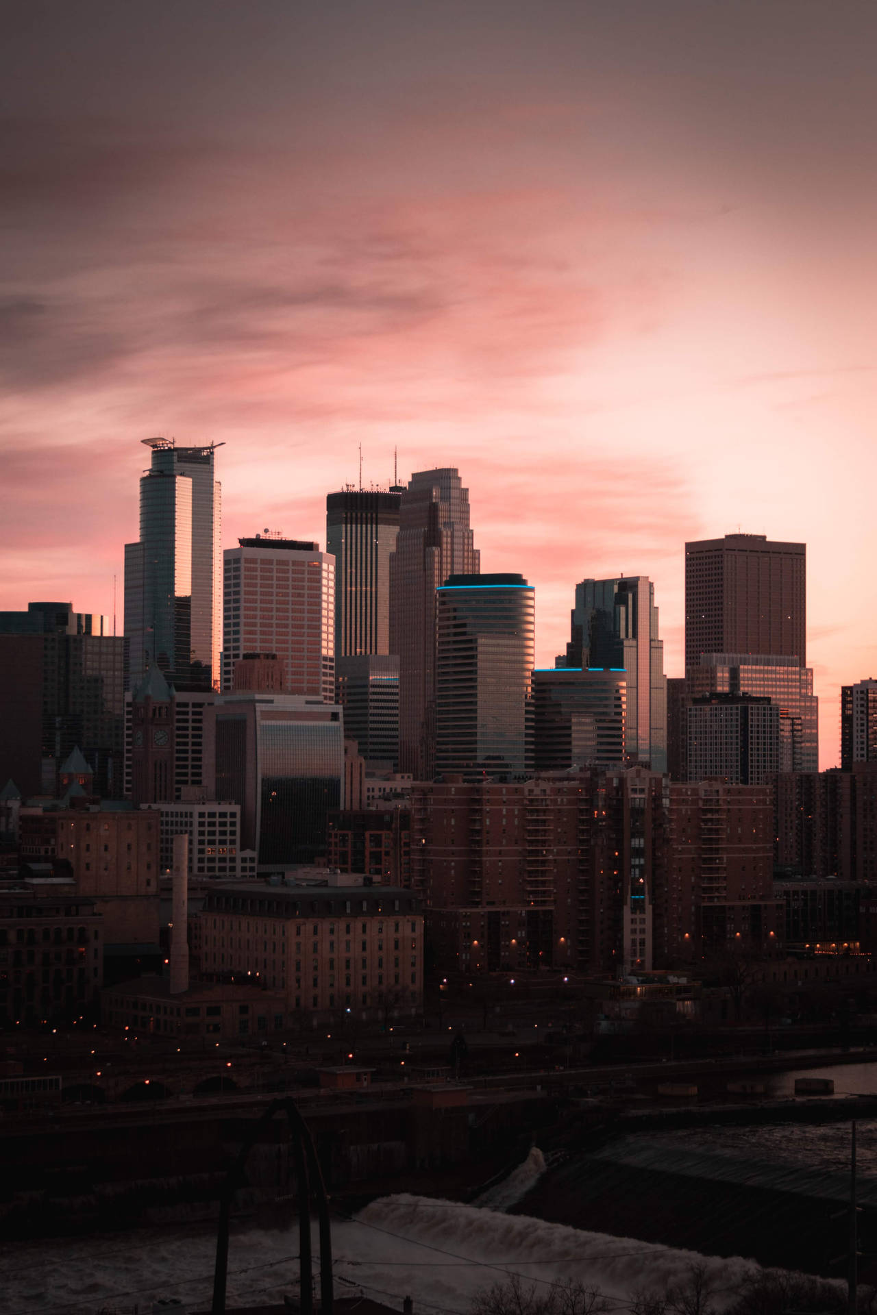 Skylines And Pink Clouds City Background Background