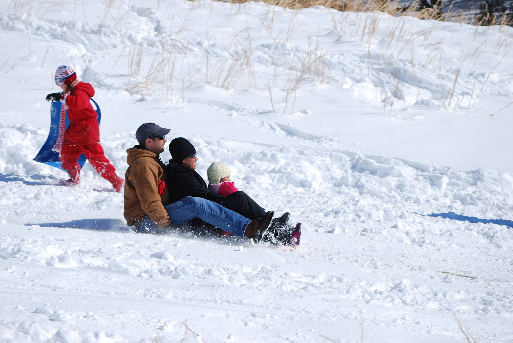 Sledding In Group Holiday Season Background