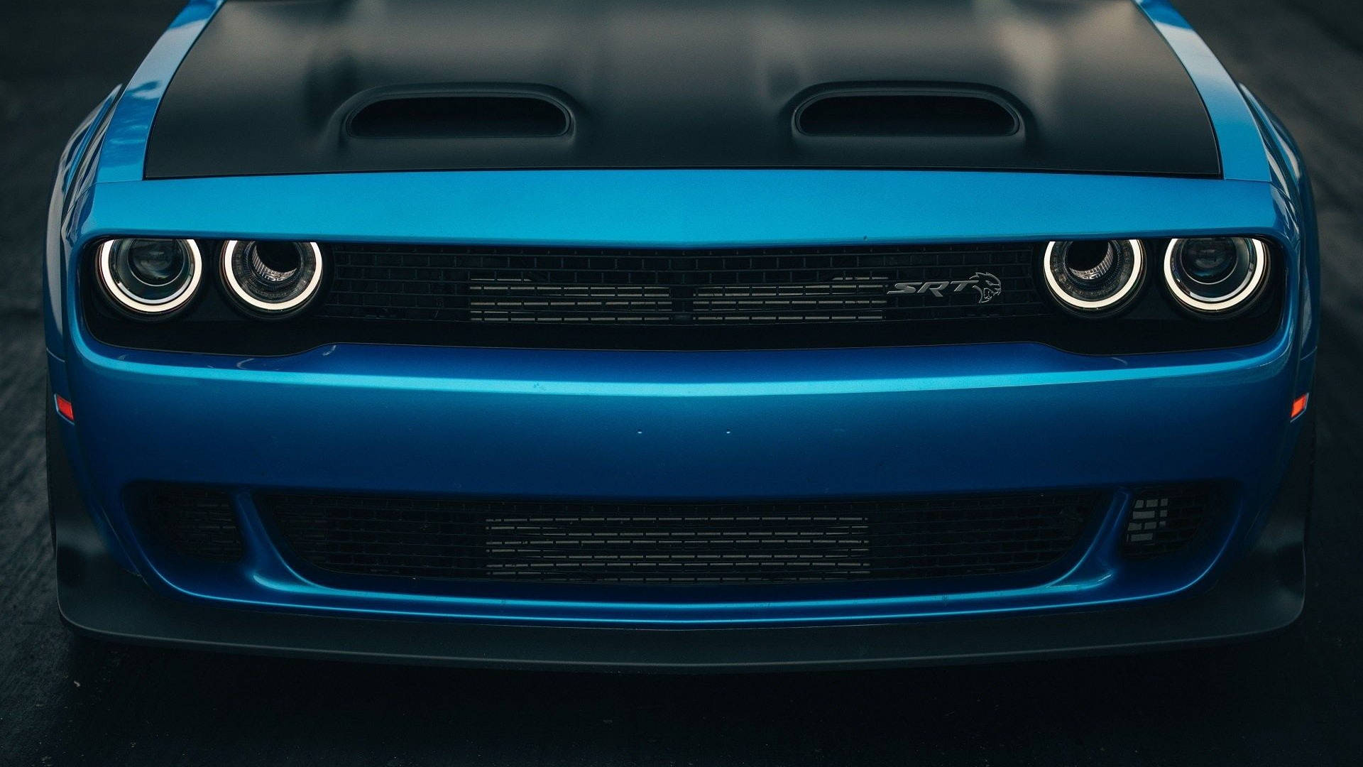 Sleek 2019 Blue Dodge Challenger Close-up Background