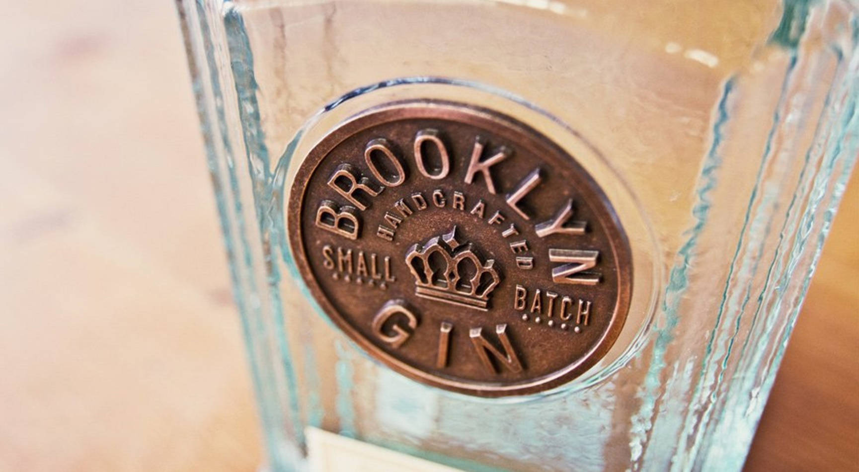 Sleek And Minimalist Brooklyn Gin Logo Background