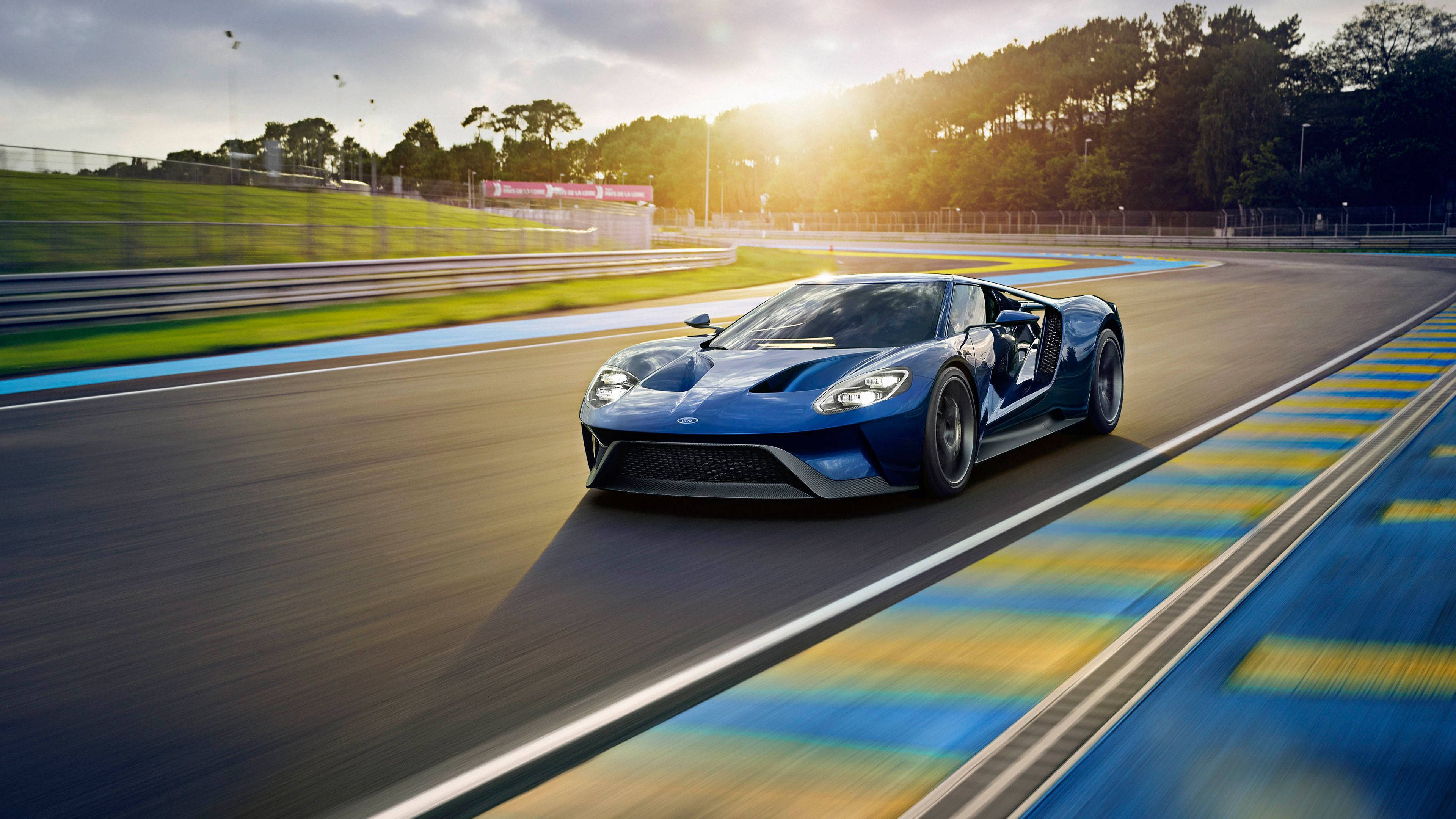 Sleek And Shiny 2017 Ford Gt In Brilliant Blue Background