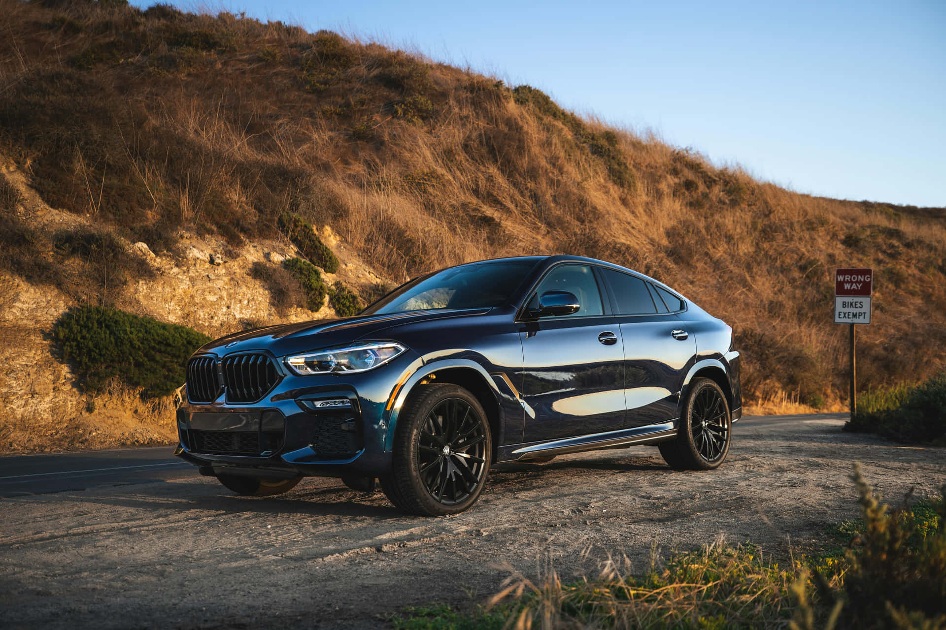 Sleek_ Black_ Coupe_ S U V_ Dusk_ Lighting Background