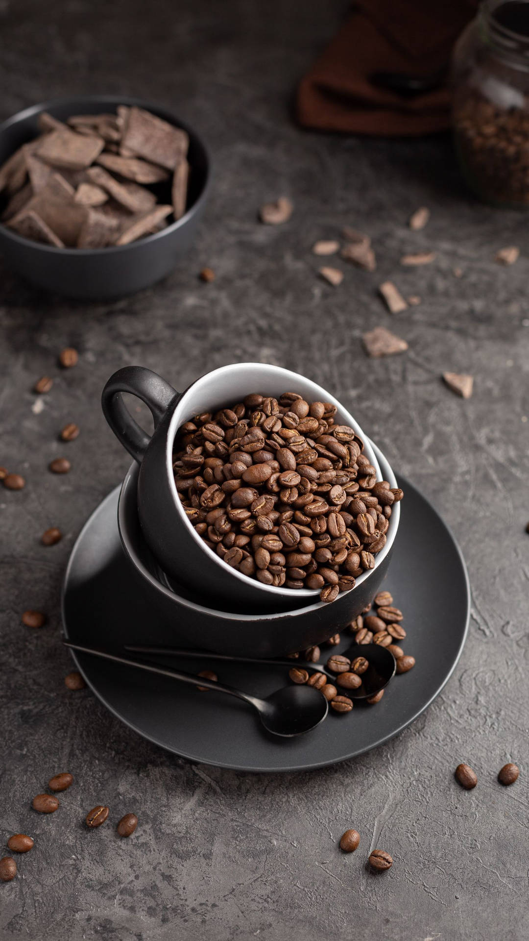 Sleek Black Cup Full Of Coffee Beans