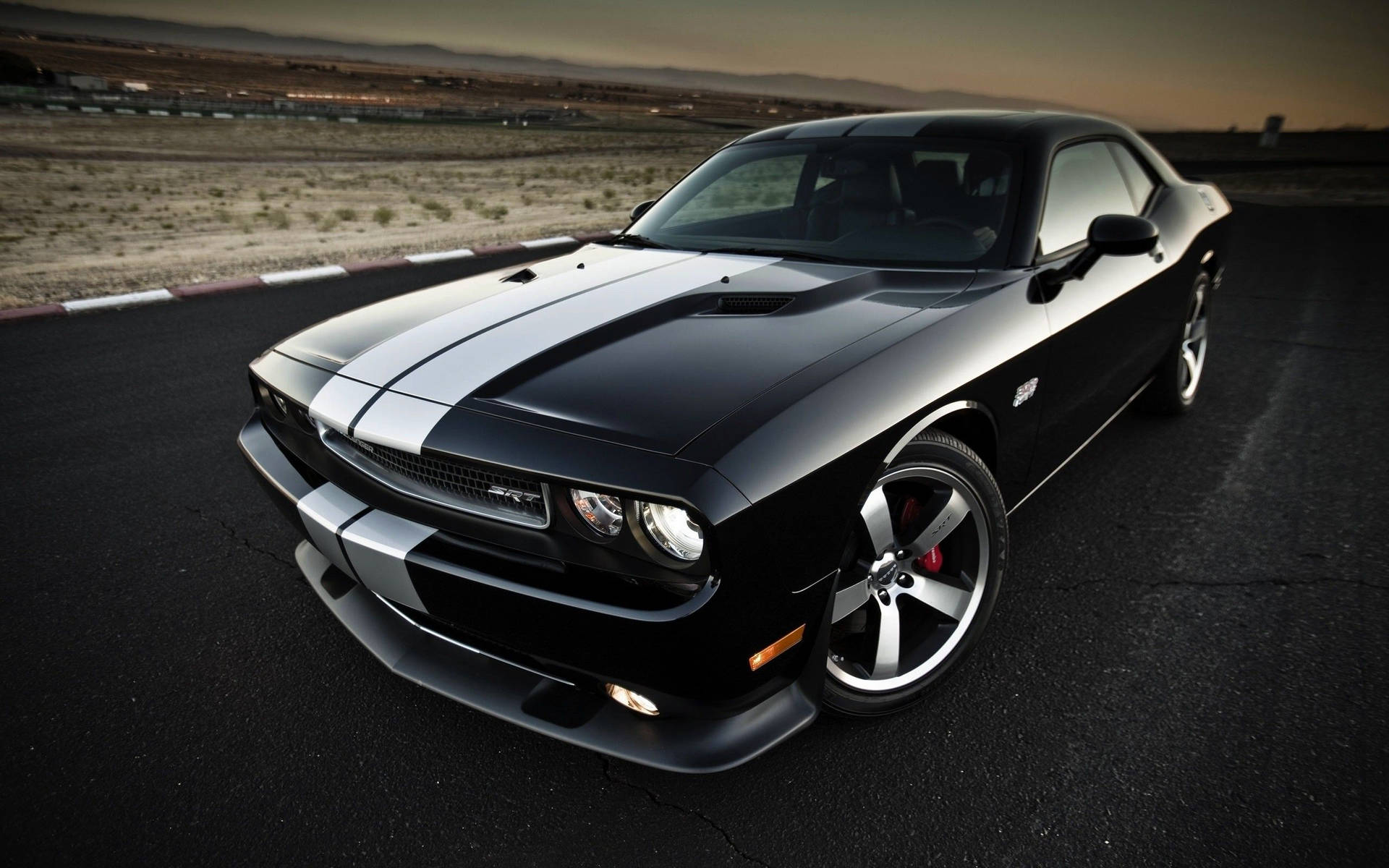 Sleek Black Dodge Challenger Background
