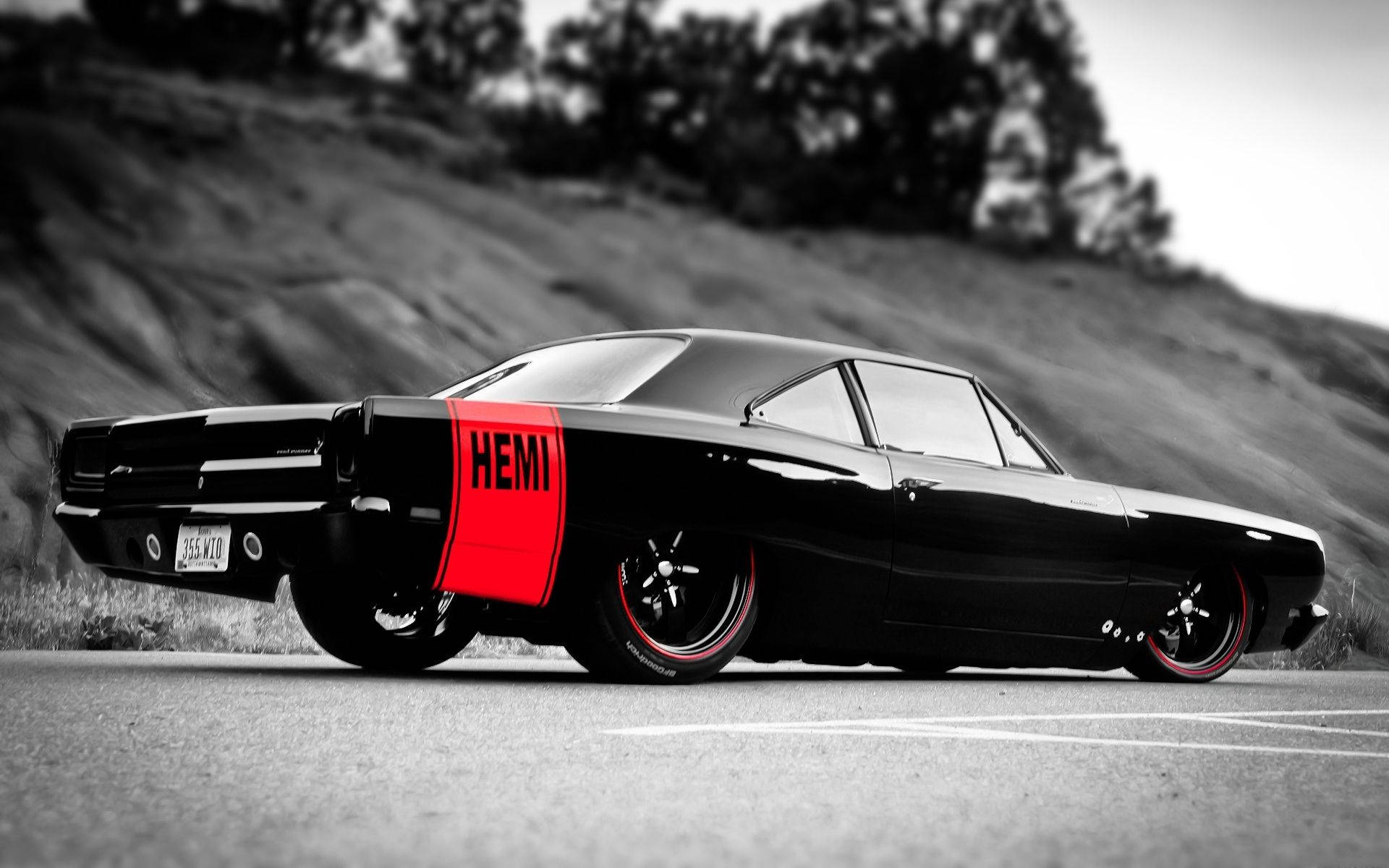 Sleek Black Muscle Car Background