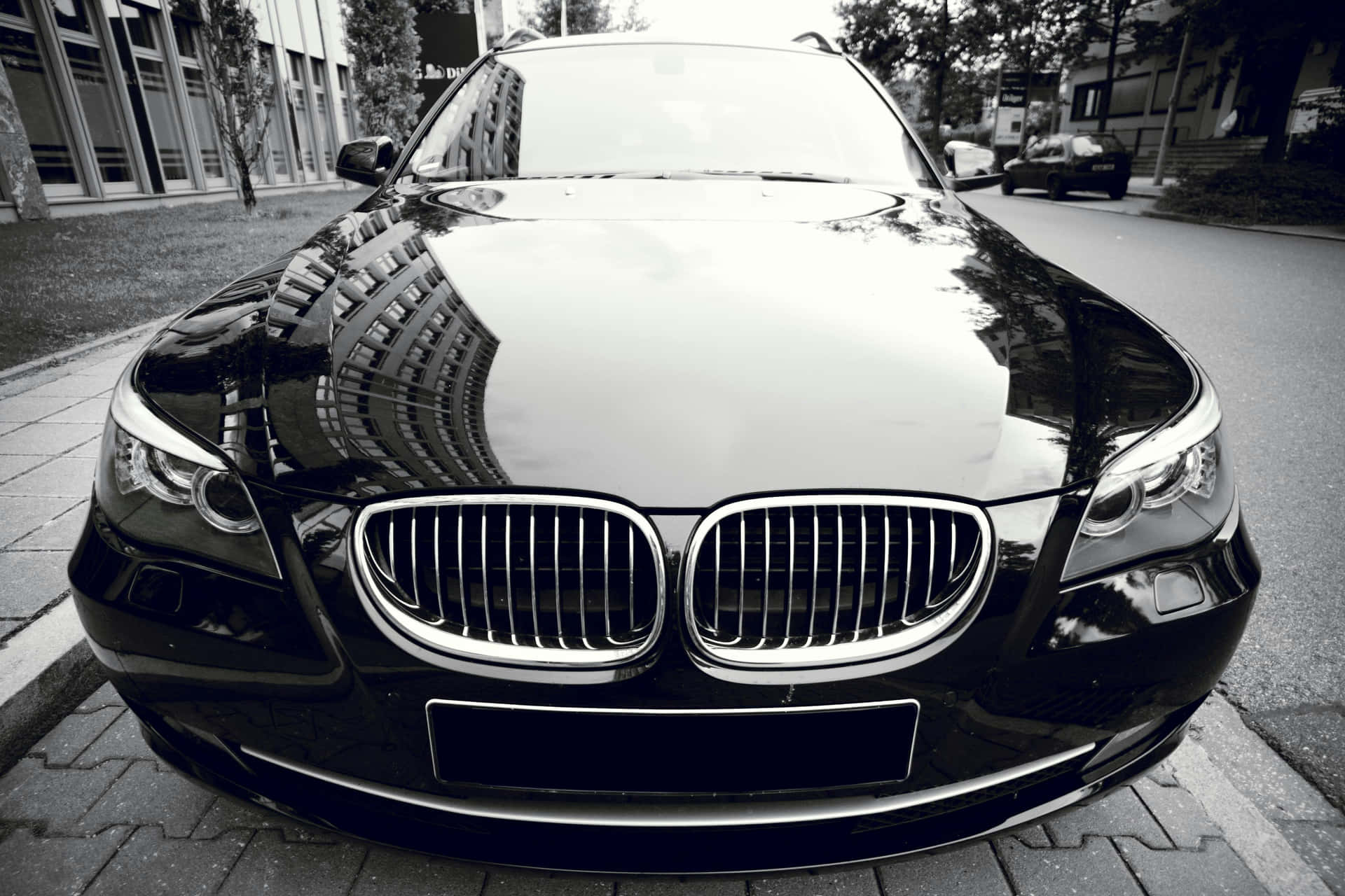 Sleek Black Sedan Closeup Background
