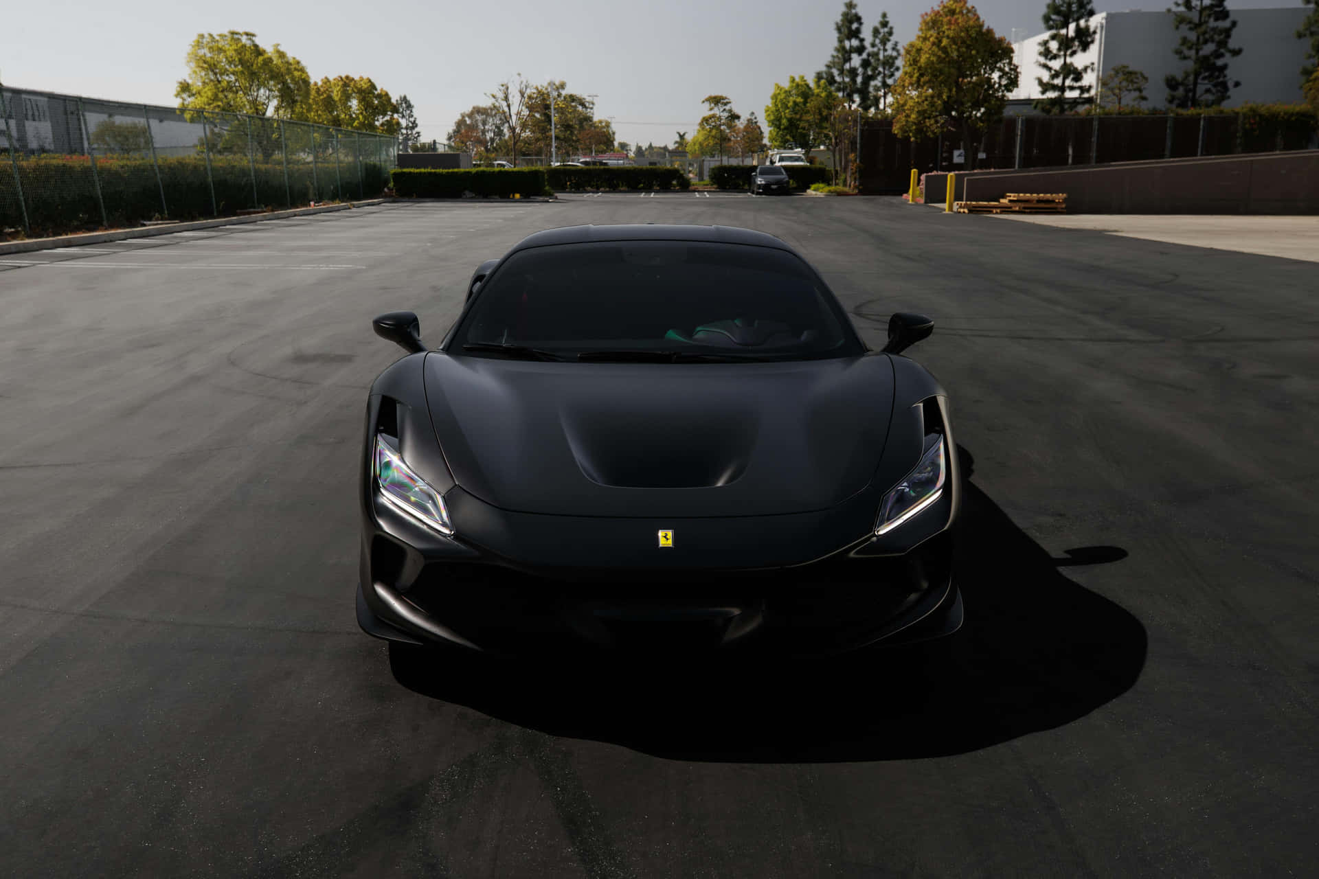 Sleek_ Black_ Sports_ Car_ Parked_ Outdoors.jpg Background