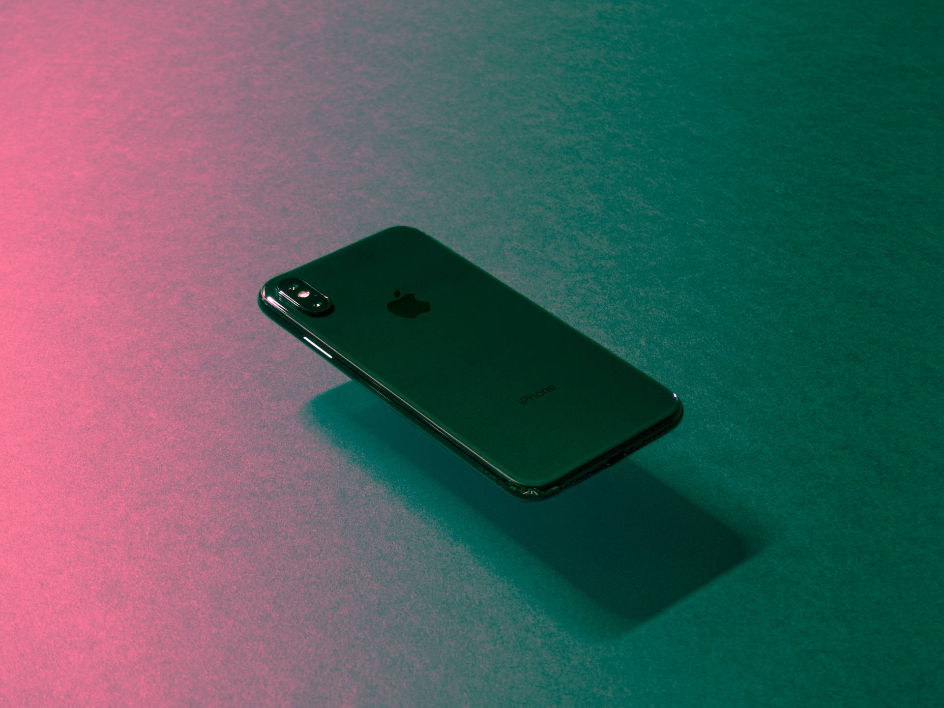 Sleek Iphone X With A Stunning Display Background