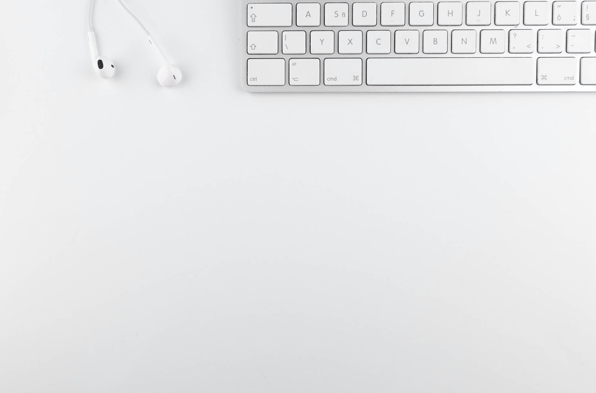 Sleek Keyboard On A White Background Background