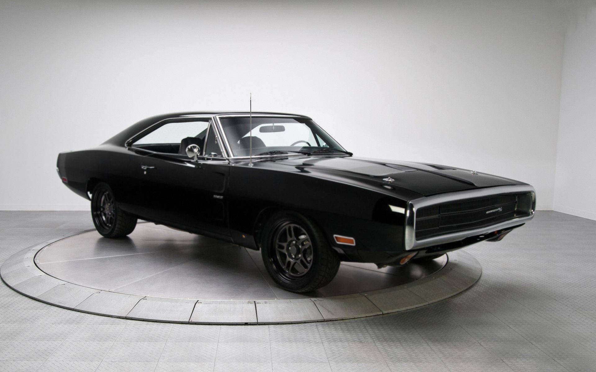 Sleek Matte Black 1969 Dodge Charger - Classic American Muscle Background
