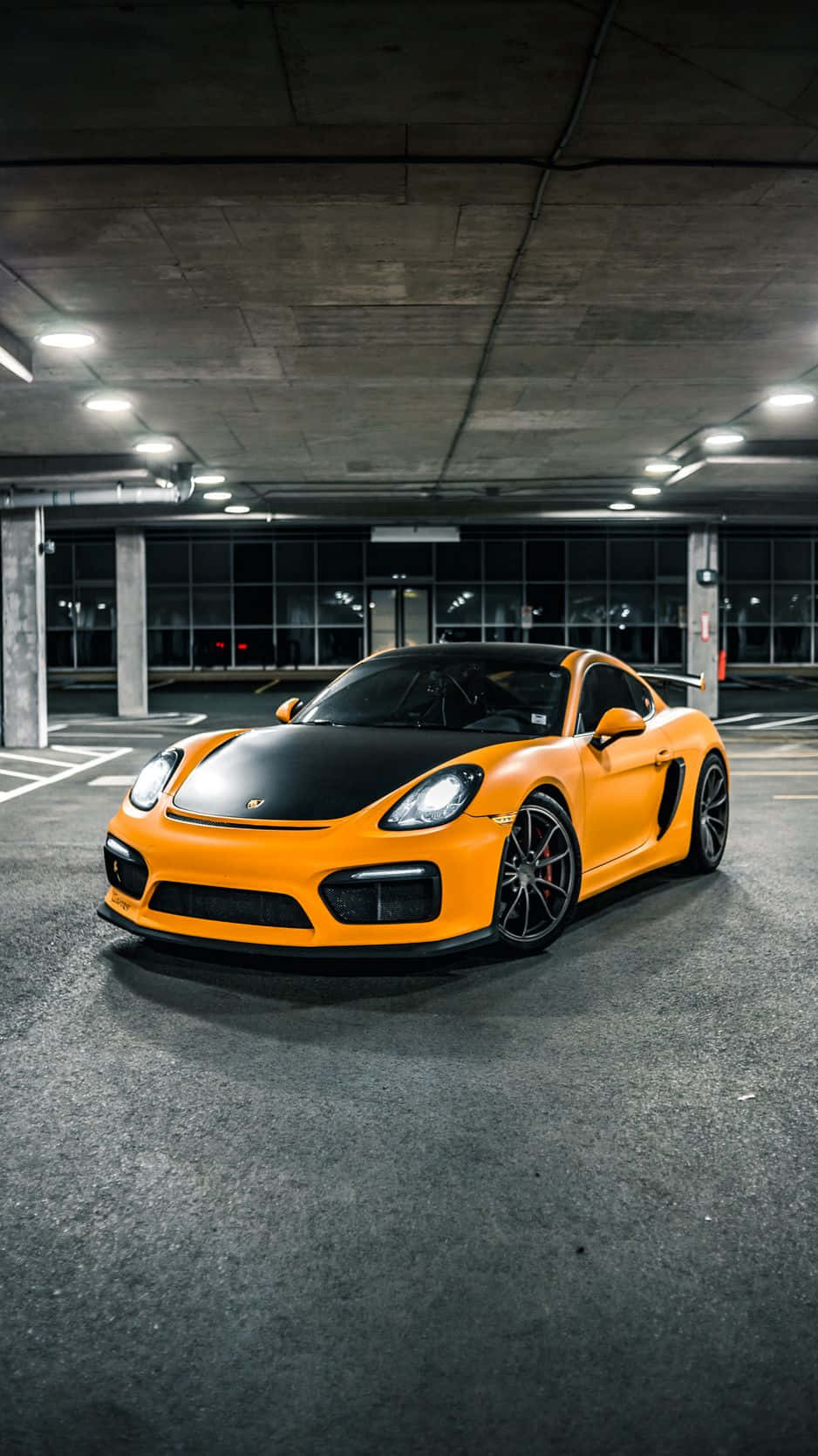 Sleek Porsche Sports Car On A Stunning Iphone Wallpaper. Background