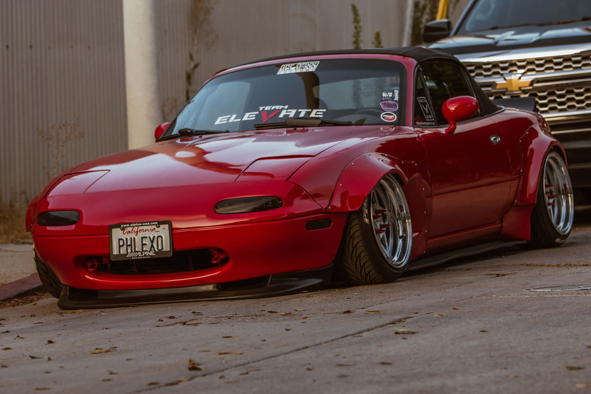 Sleek Red 1995 Mazda Mx 5 Miata Background