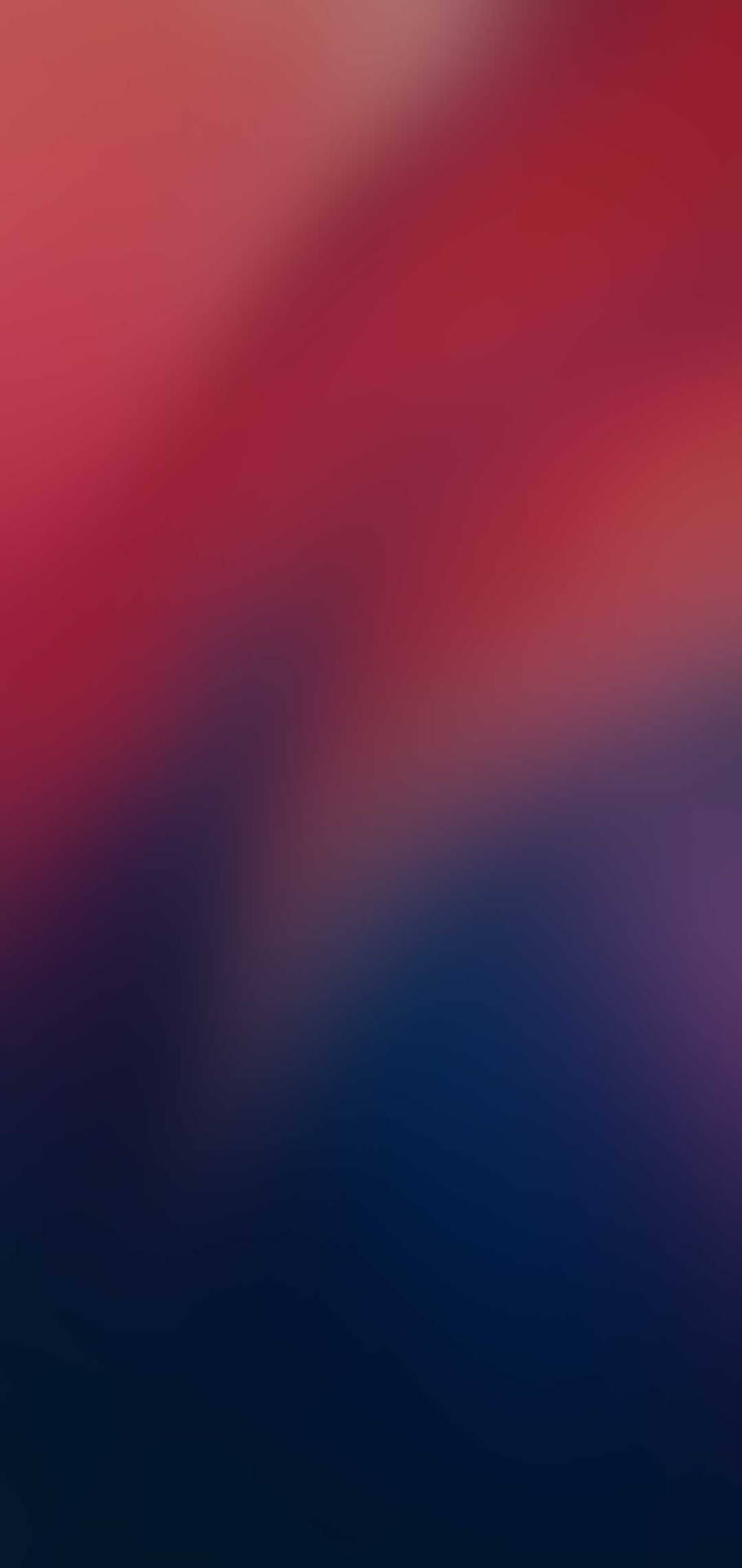 Sleek Redmi 9 With Red Blue Gradient Blur Background