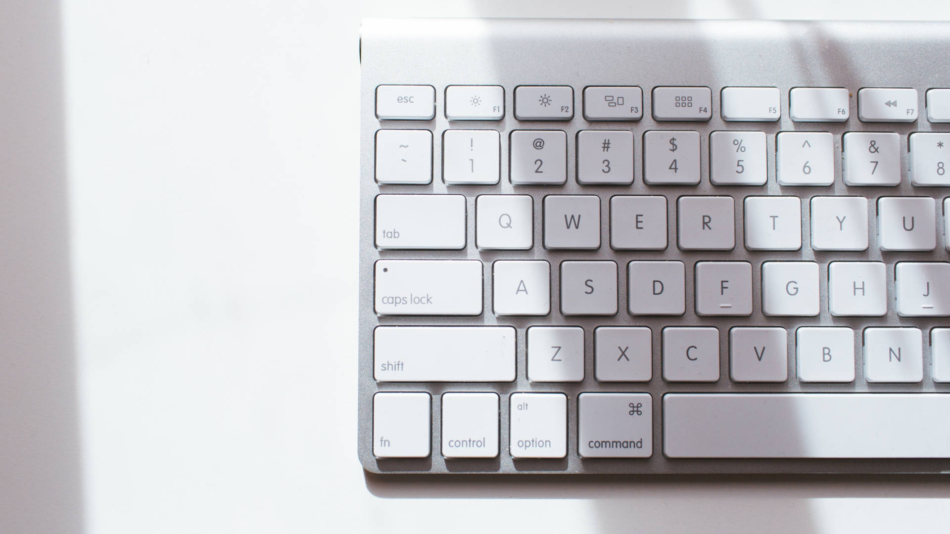 Sleek White Apple Mac Computer Keyboard Background