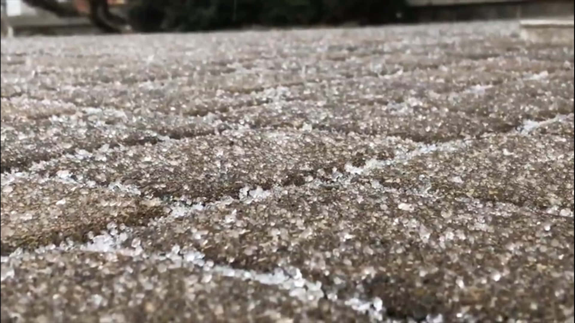 Sleet Covering A Brick Road Background