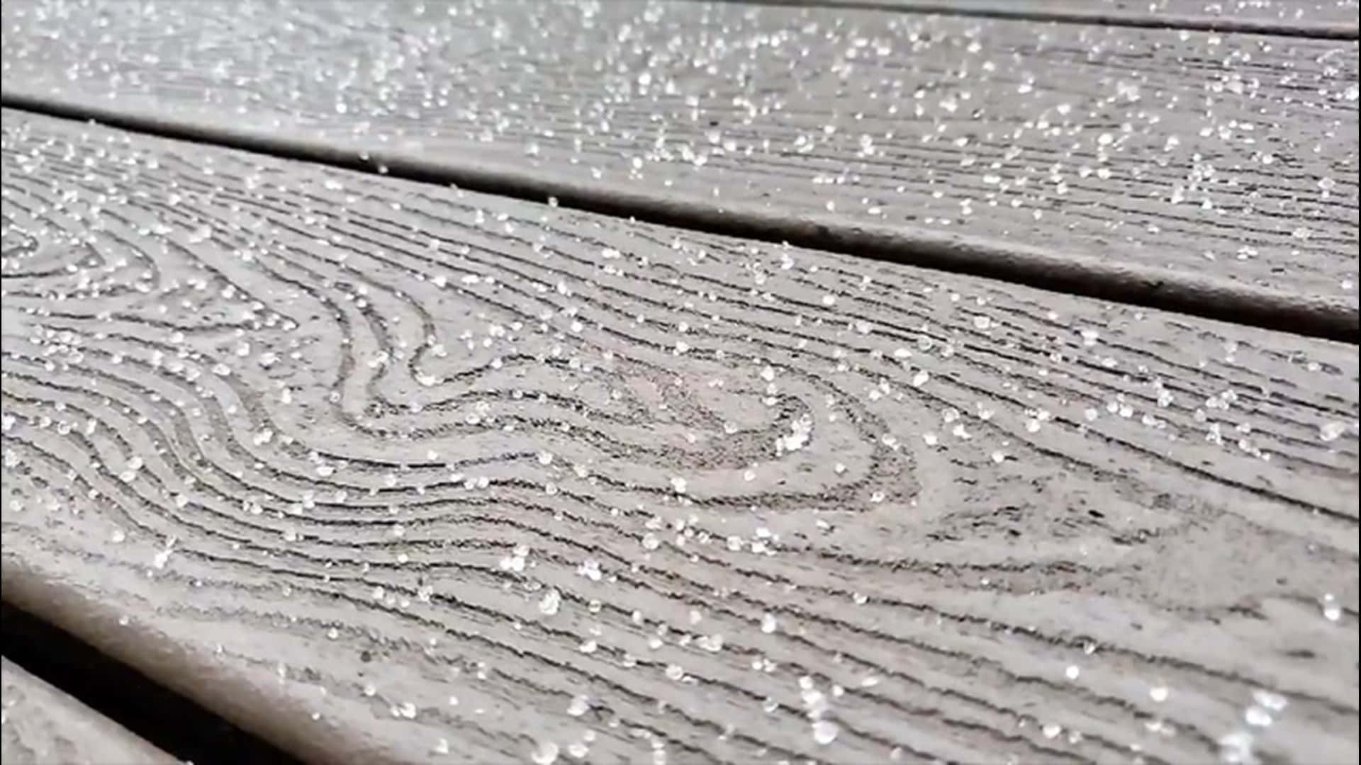 Sleet Fallen On A Wood Background