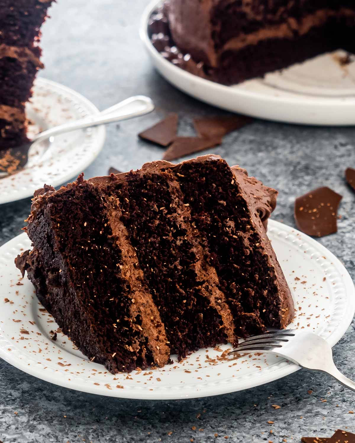 Slice Of Chocolate Cake On A Plate Background