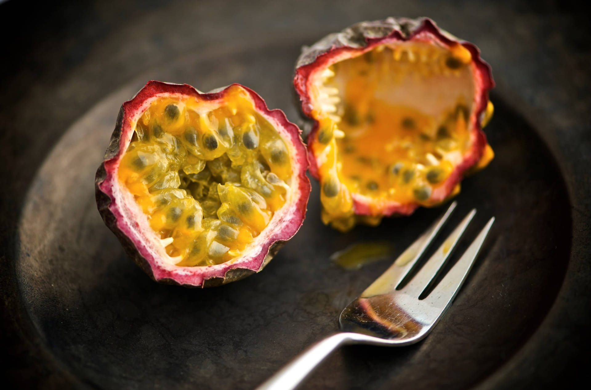 Sliced And Eaten Ripe Passion Fruit Background