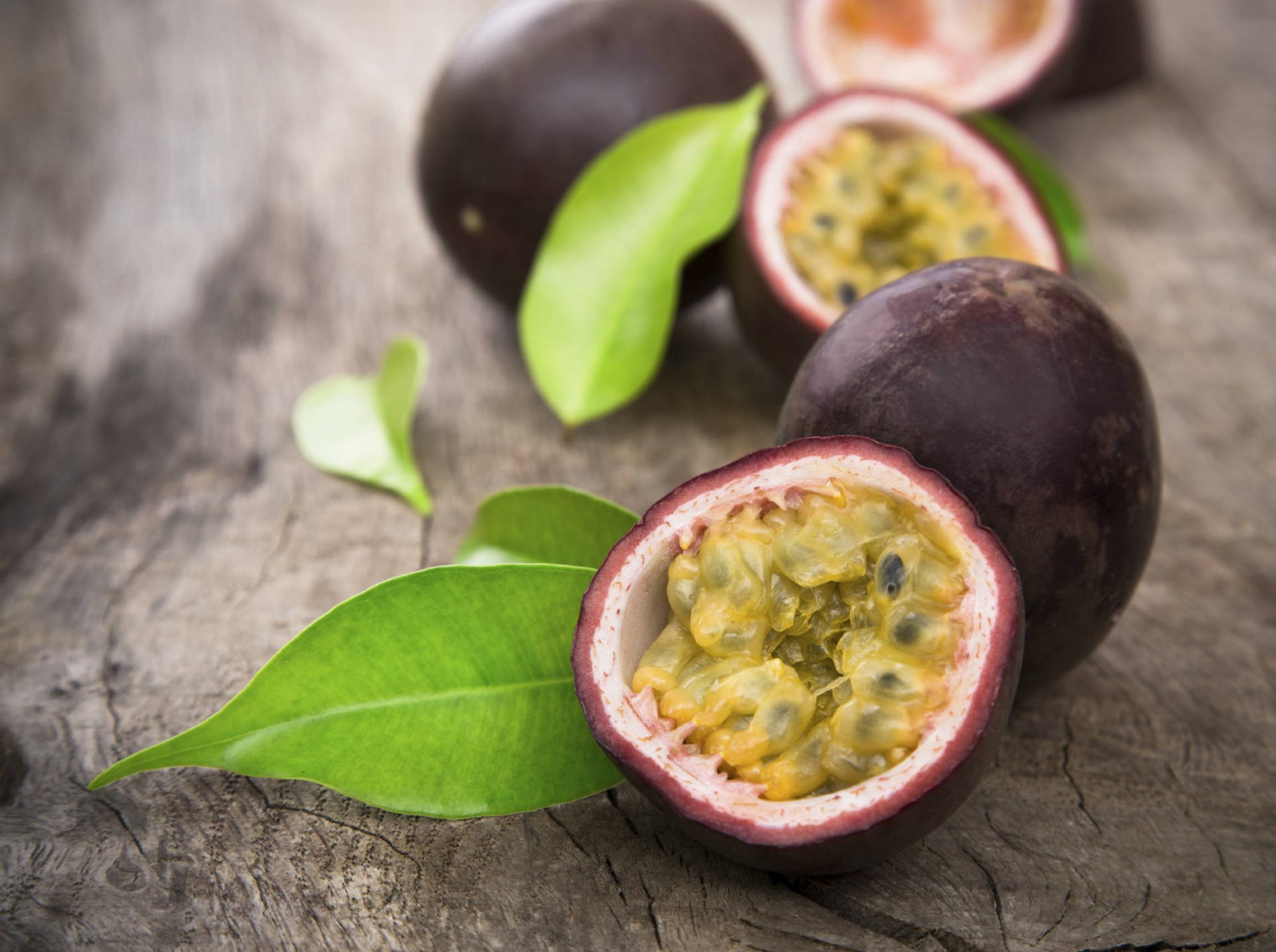 Sliced Open Fresh Passion Fruit Lined Up Background