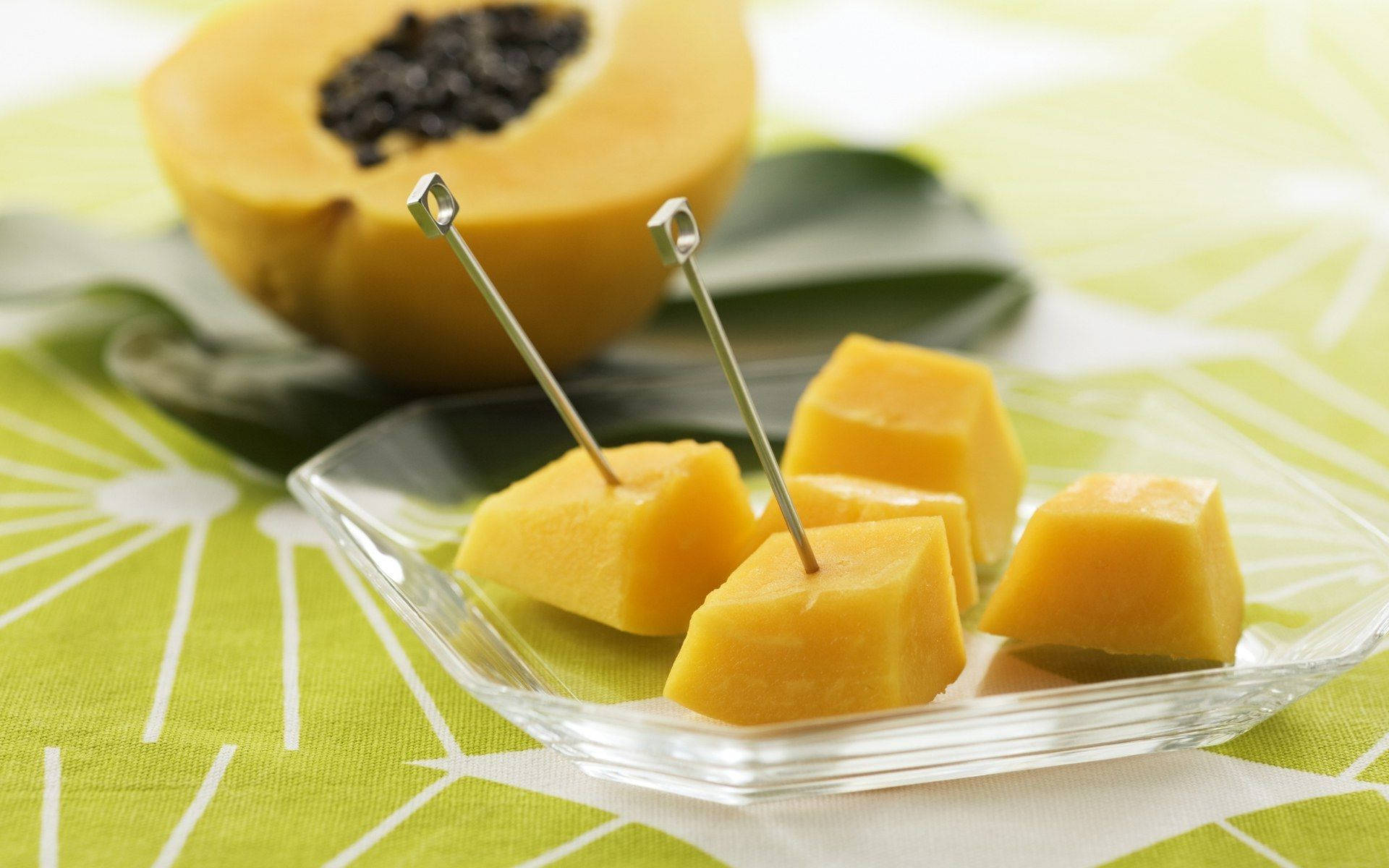 Sliced Papaya In Fruit Picks Background