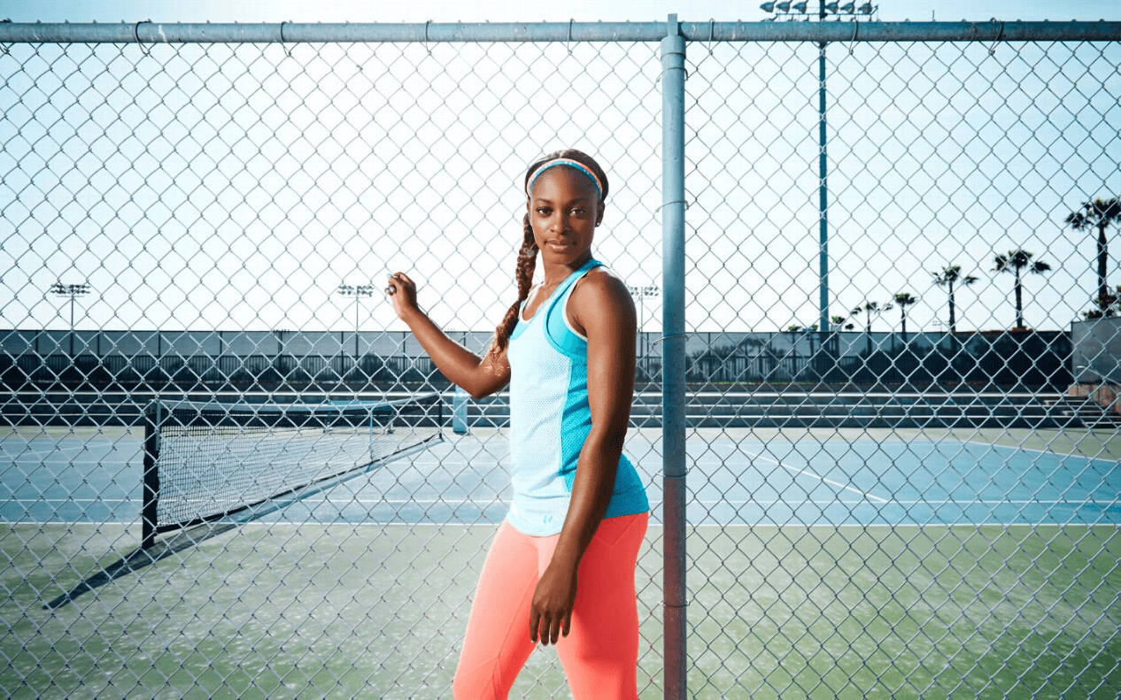 Sloane Stephens At A Tennis Court Background