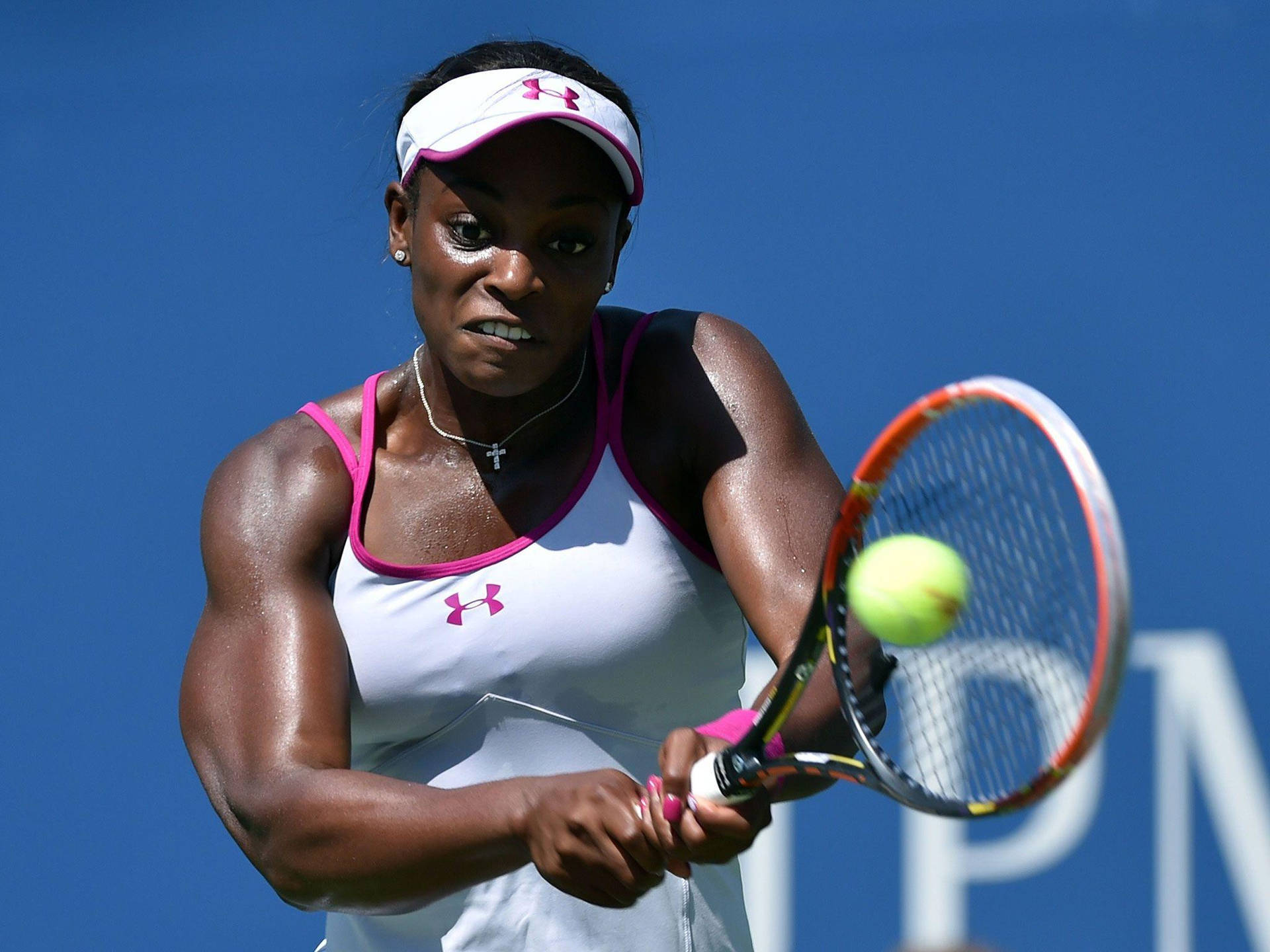 Sloane Stephens Hitting A Tennis Ball Background