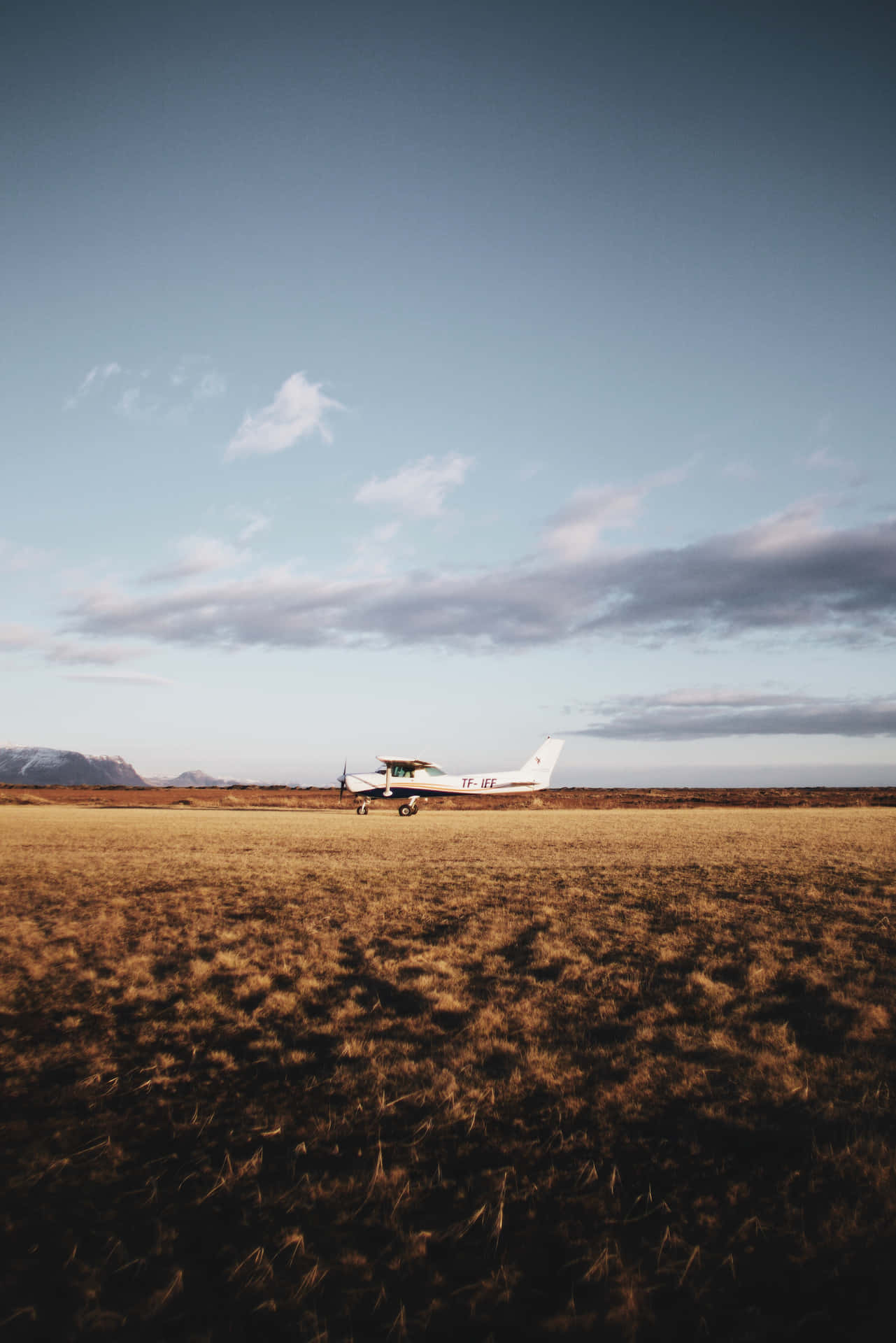 Small Airplane On Grassland Background