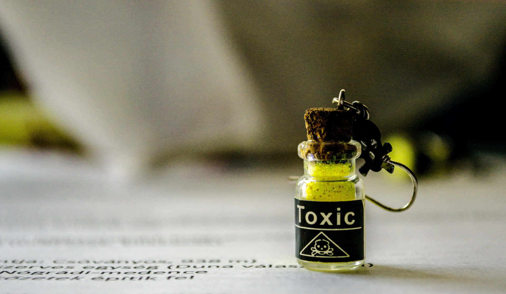 Small Bottle With Toxic Label Background