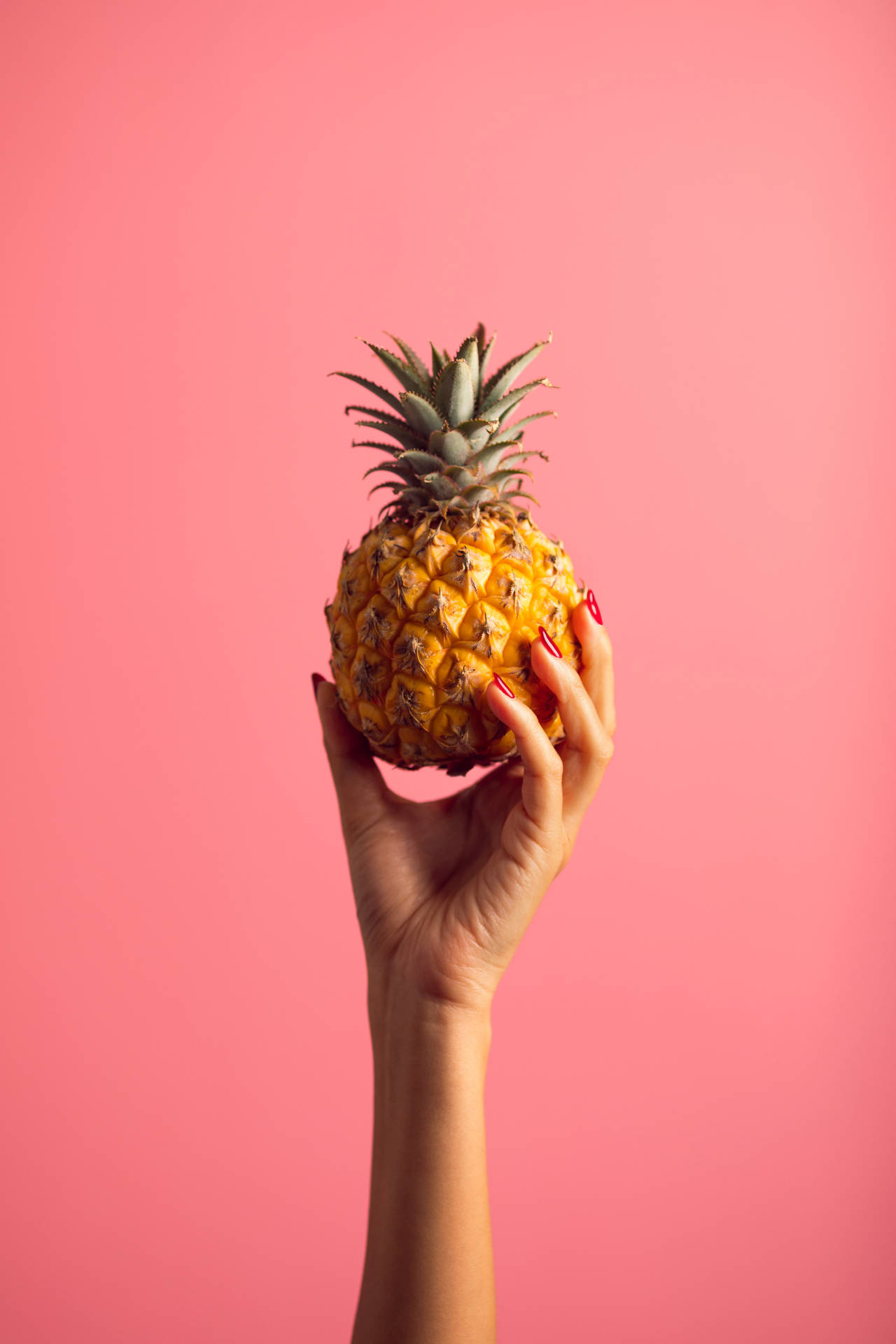 Small Pineapple On Pink Background Background
