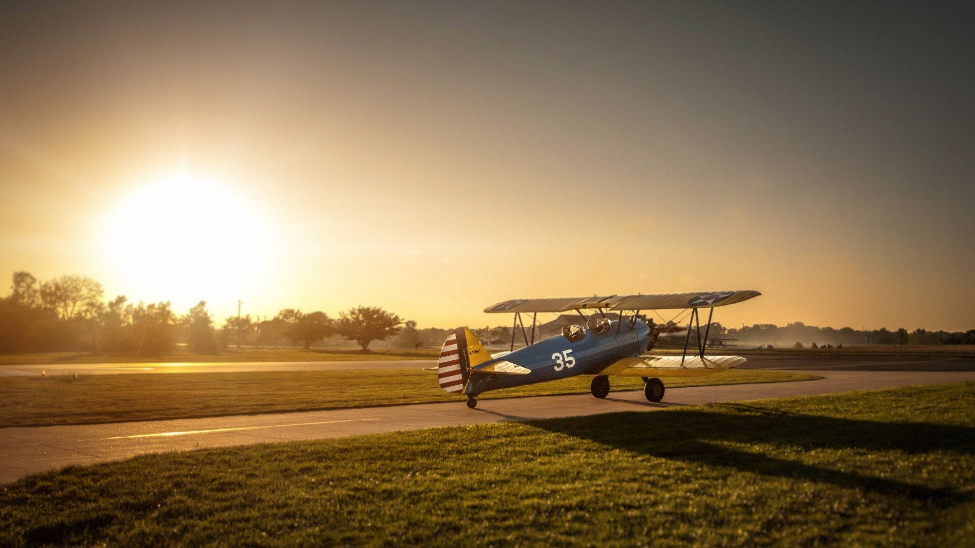 Small Plane And Sunset Background