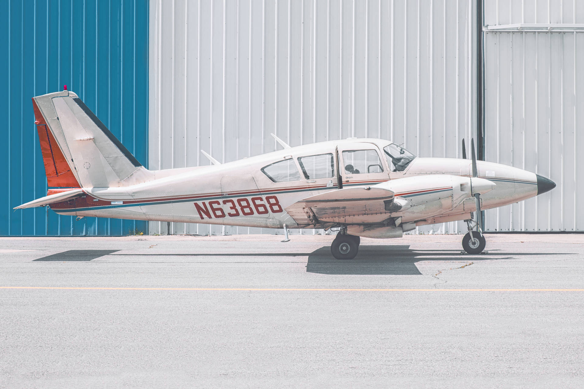 Small Plane On The Hangar Background