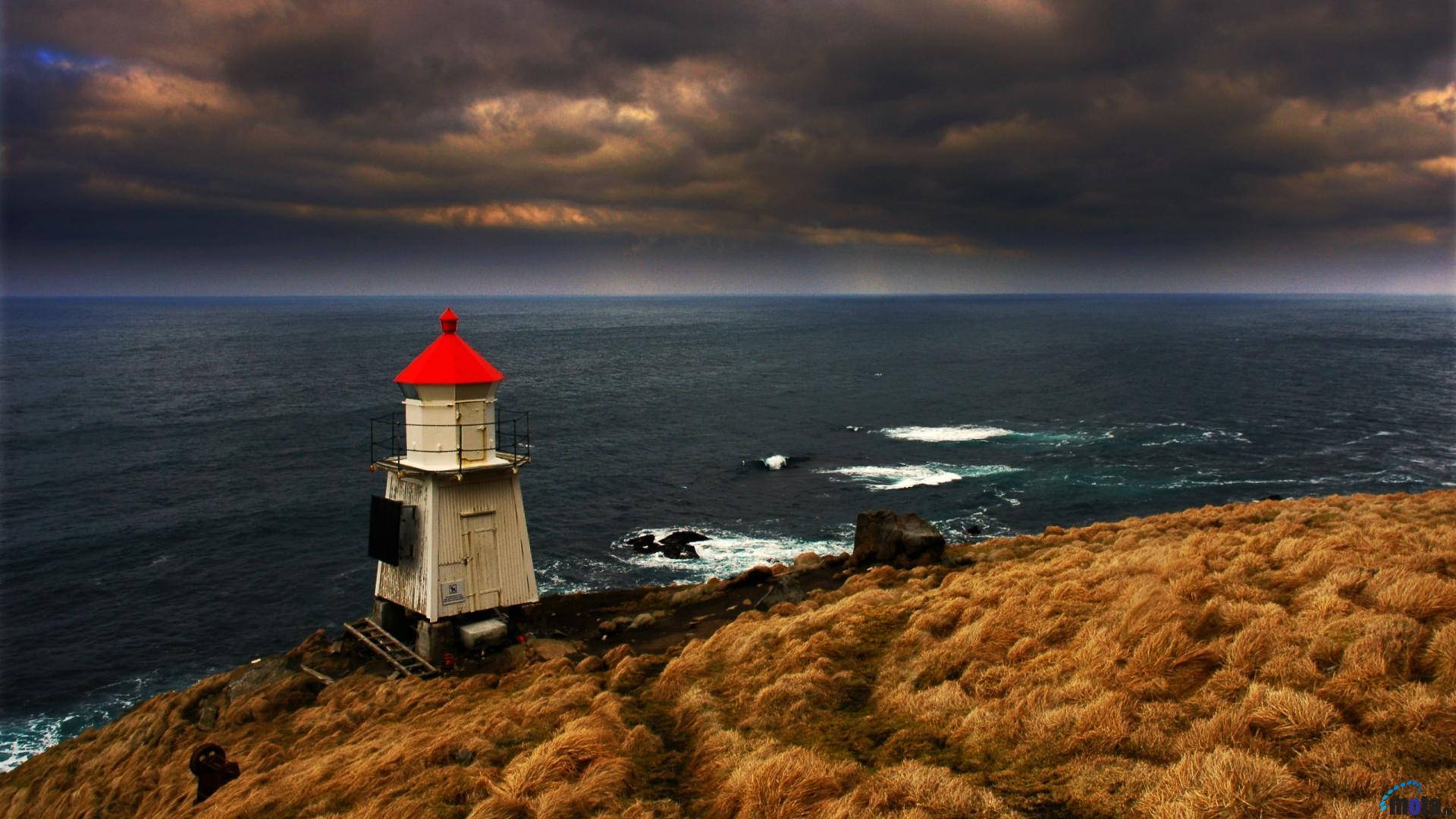 Small Red And White Lighthouse Background