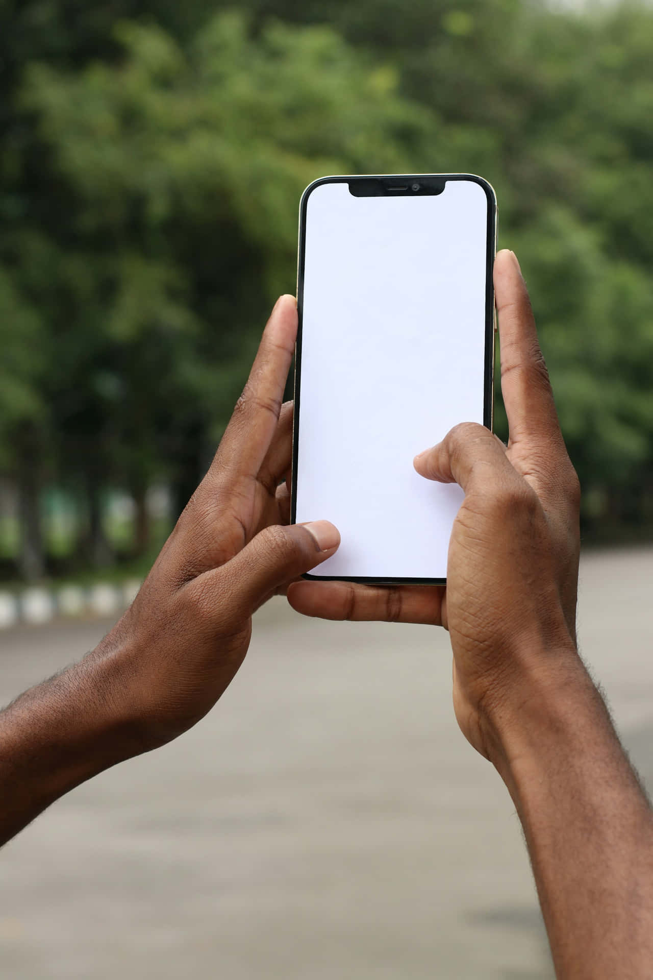 Smartphone Mockupin Hands Outdoors.jpg