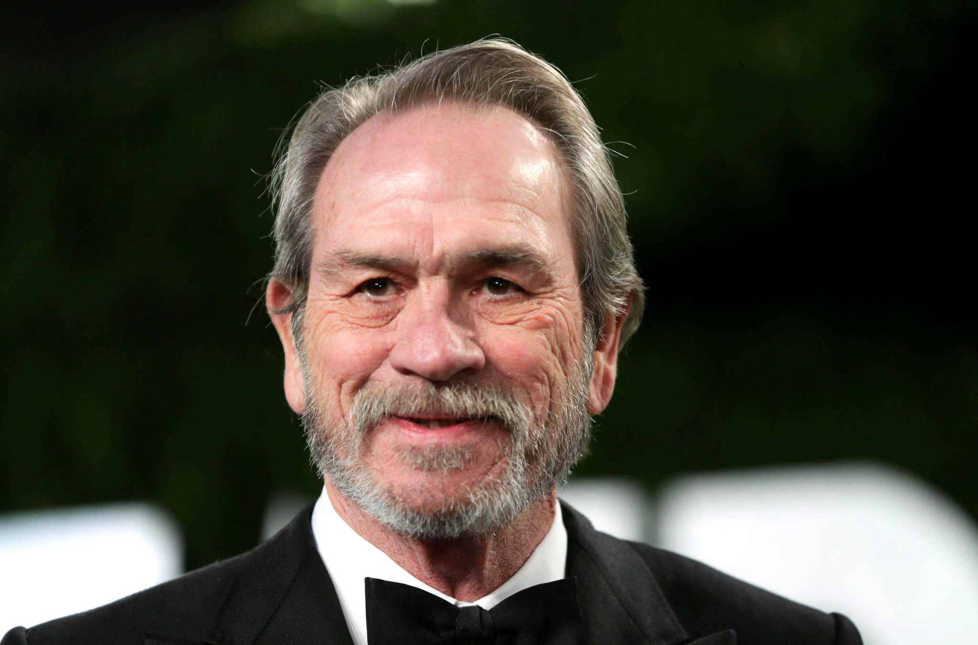 Smiley Face Of Tommy Lee Jones Background