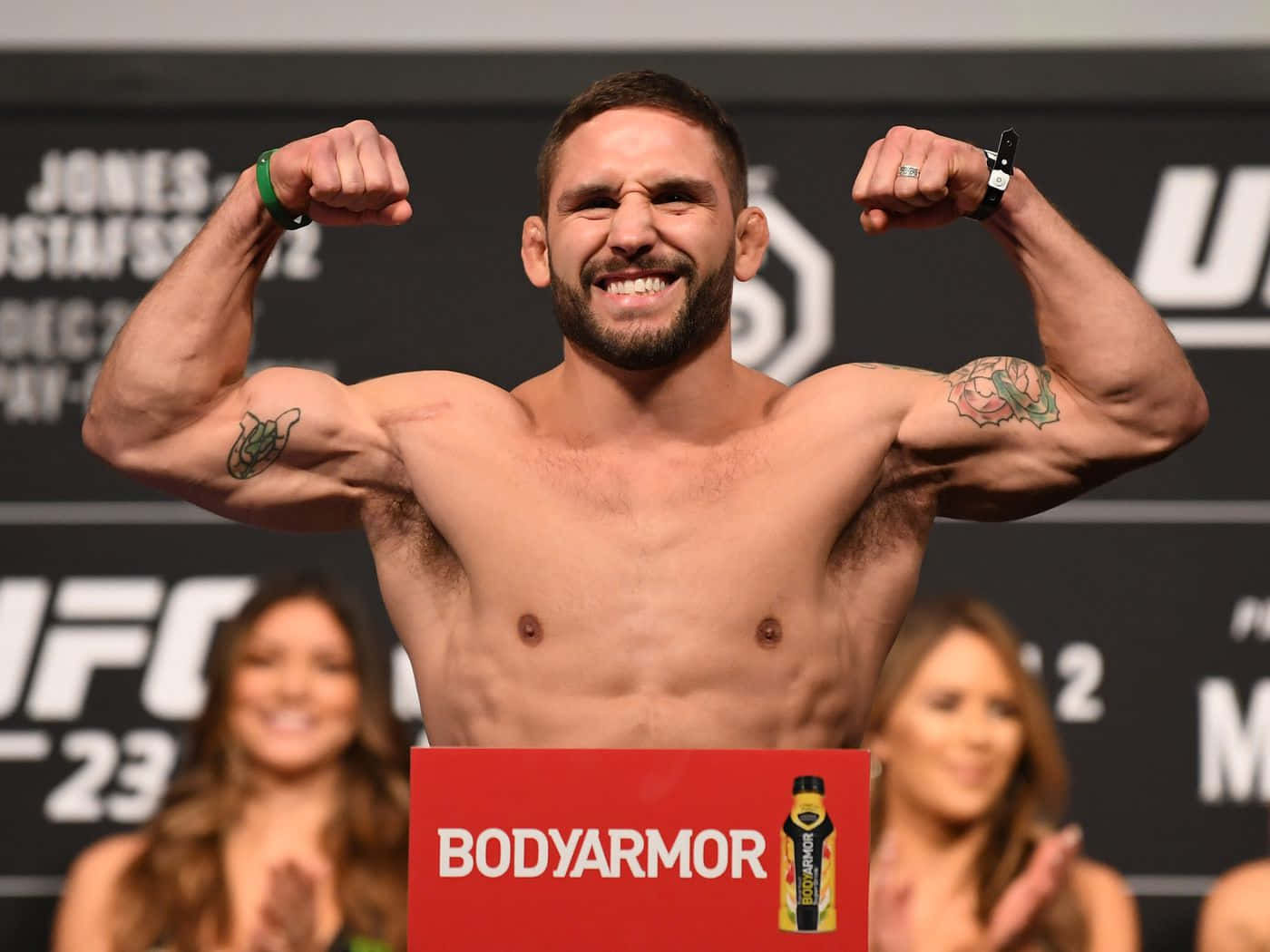 Smiling And Flexing Chad Mendes Background