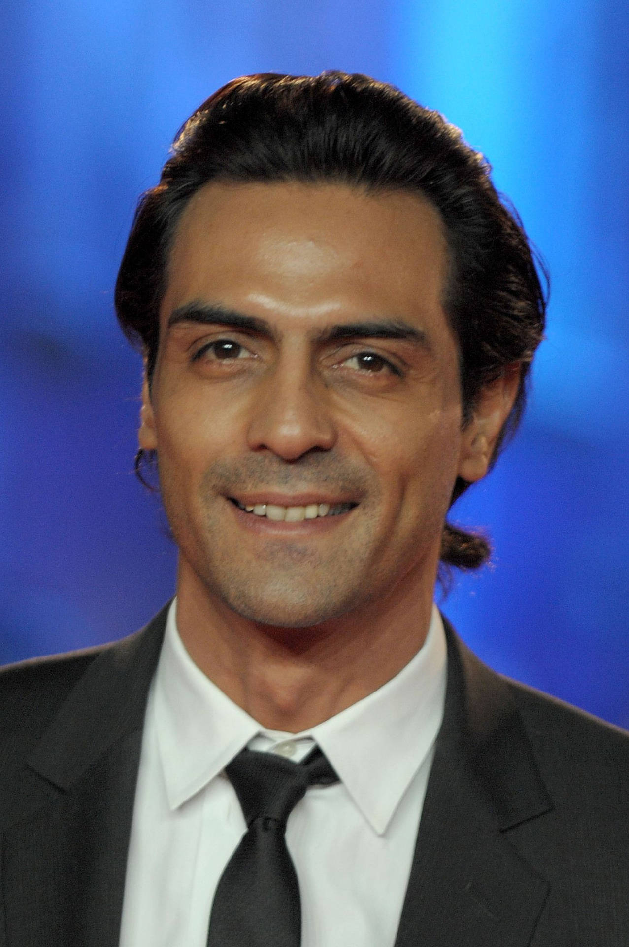 Smiling Arjun Rampal In Suit Background