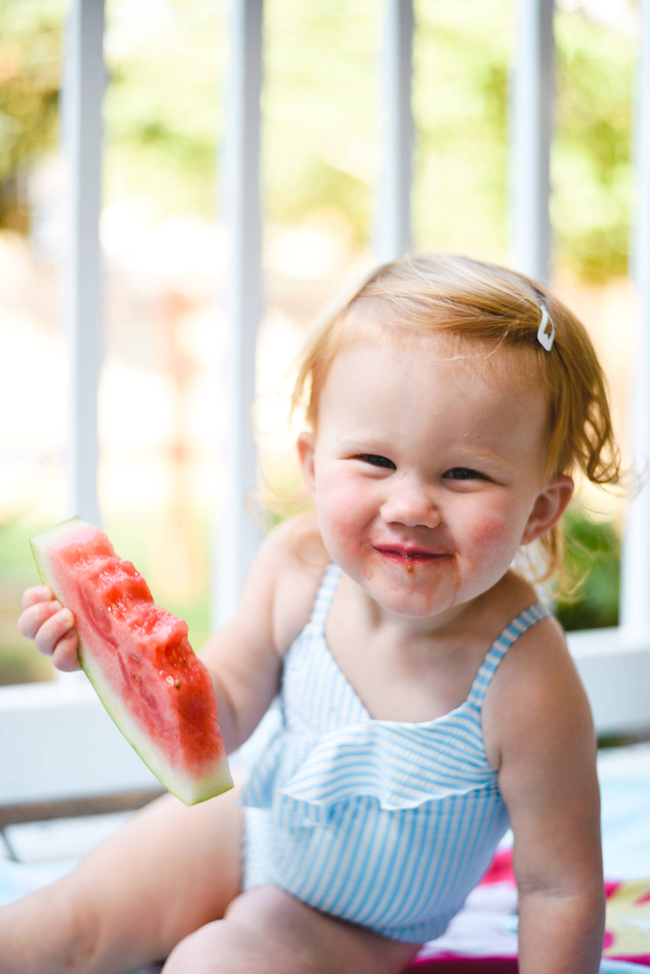 Smiling Baby With Watermelon Background