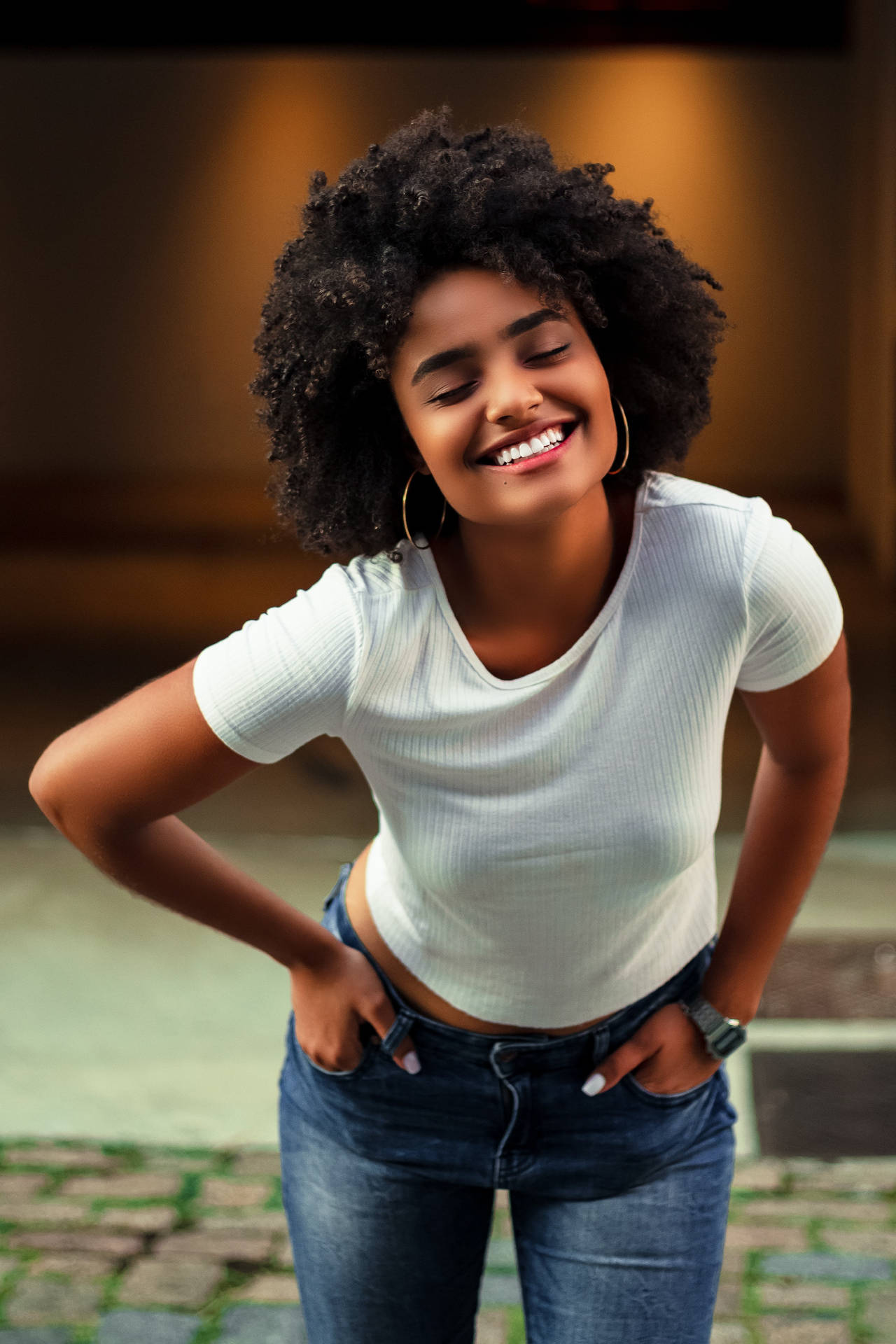 Smiling Black Woman In Afro Hairstyle Background