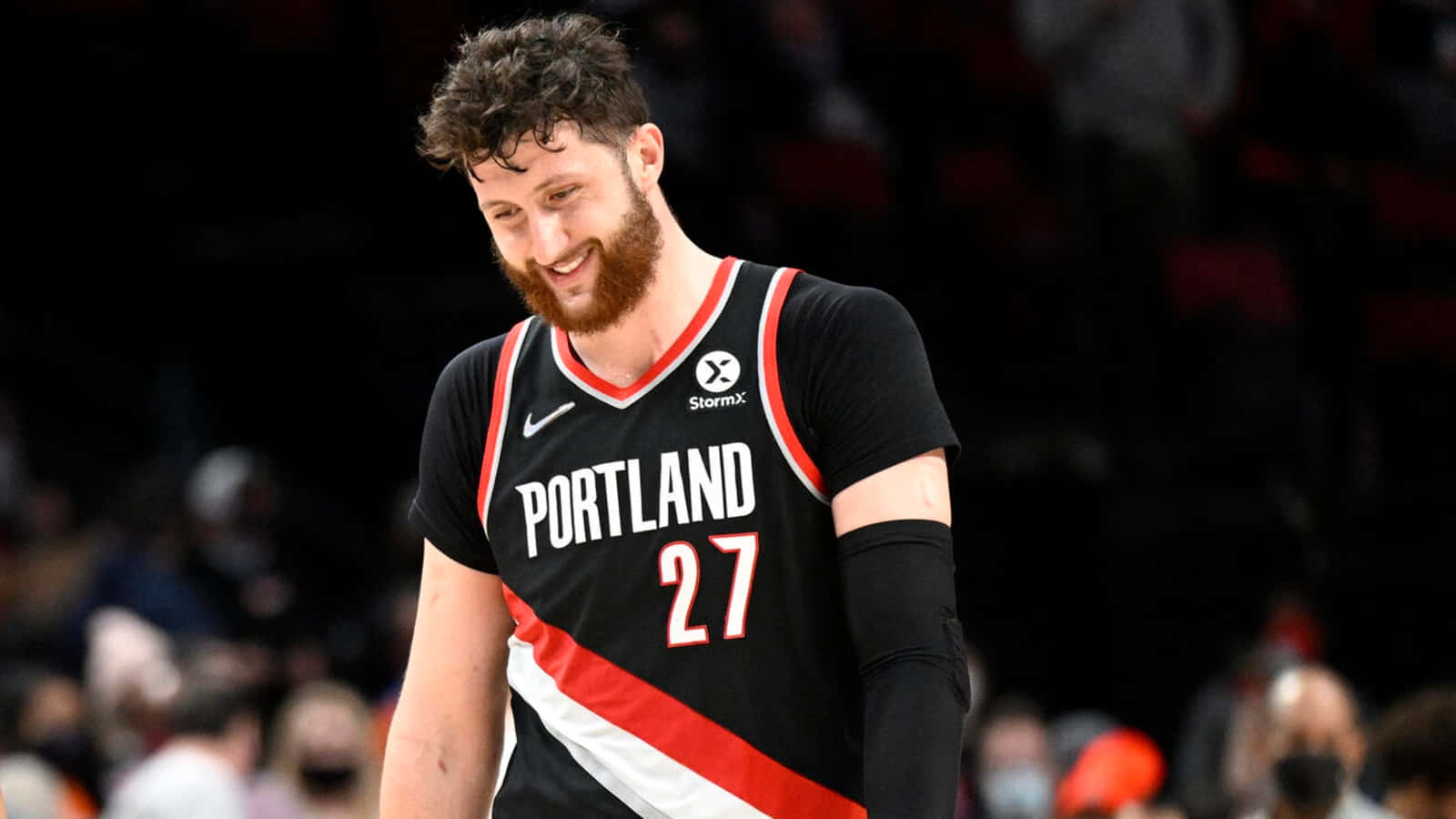 Smiling Bosnian Professional Basketball Player Jusuf Nurkic Background