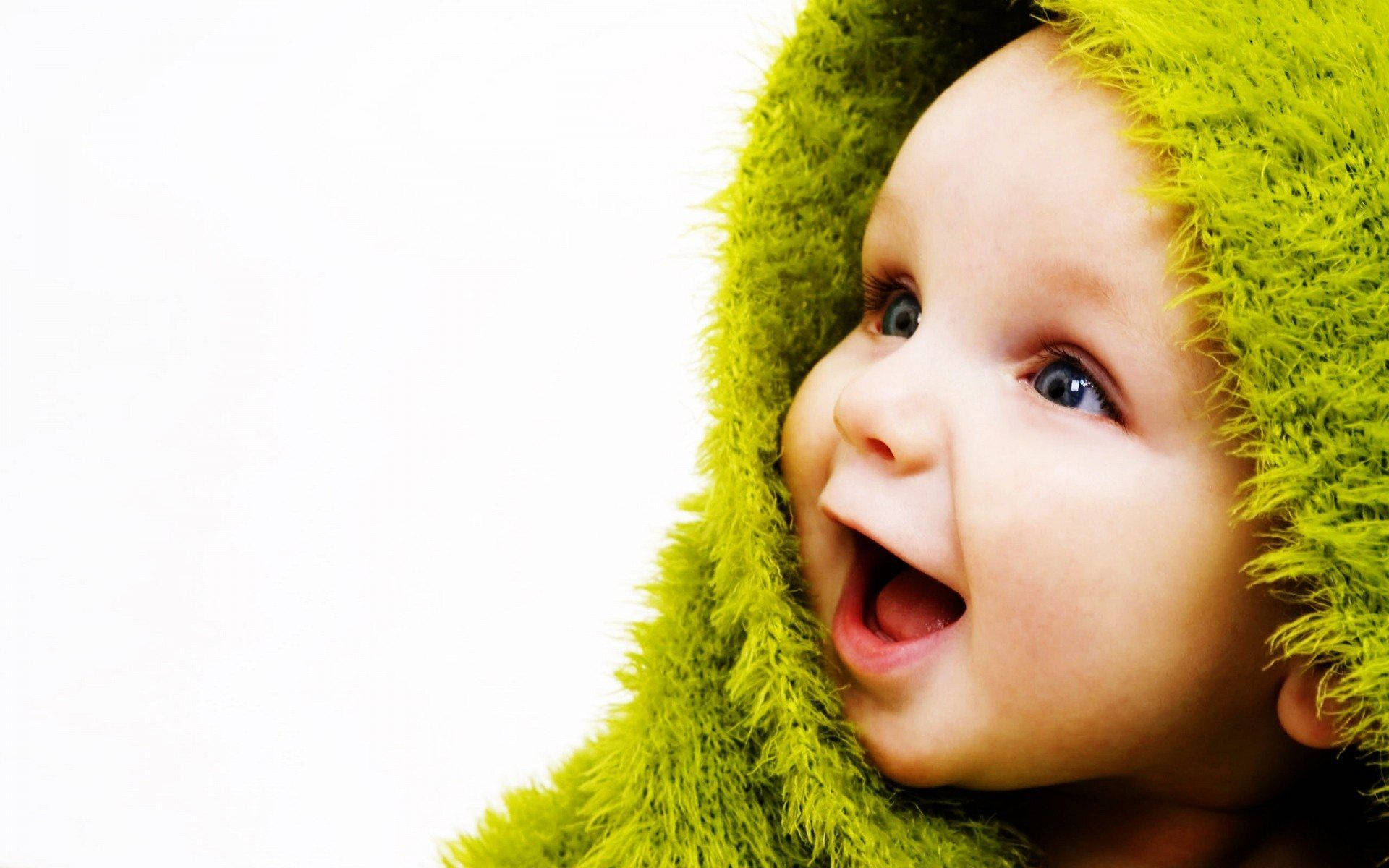 Smiling Cute Child In Green Background